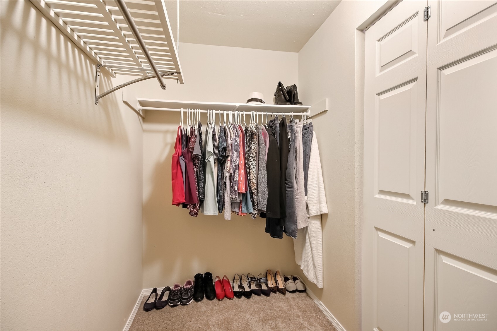 2003 Southwest 318th Place, Unit D8 Federal Way, WA 98023 - Photo 15 of 35 a view of walk in closet with clothes