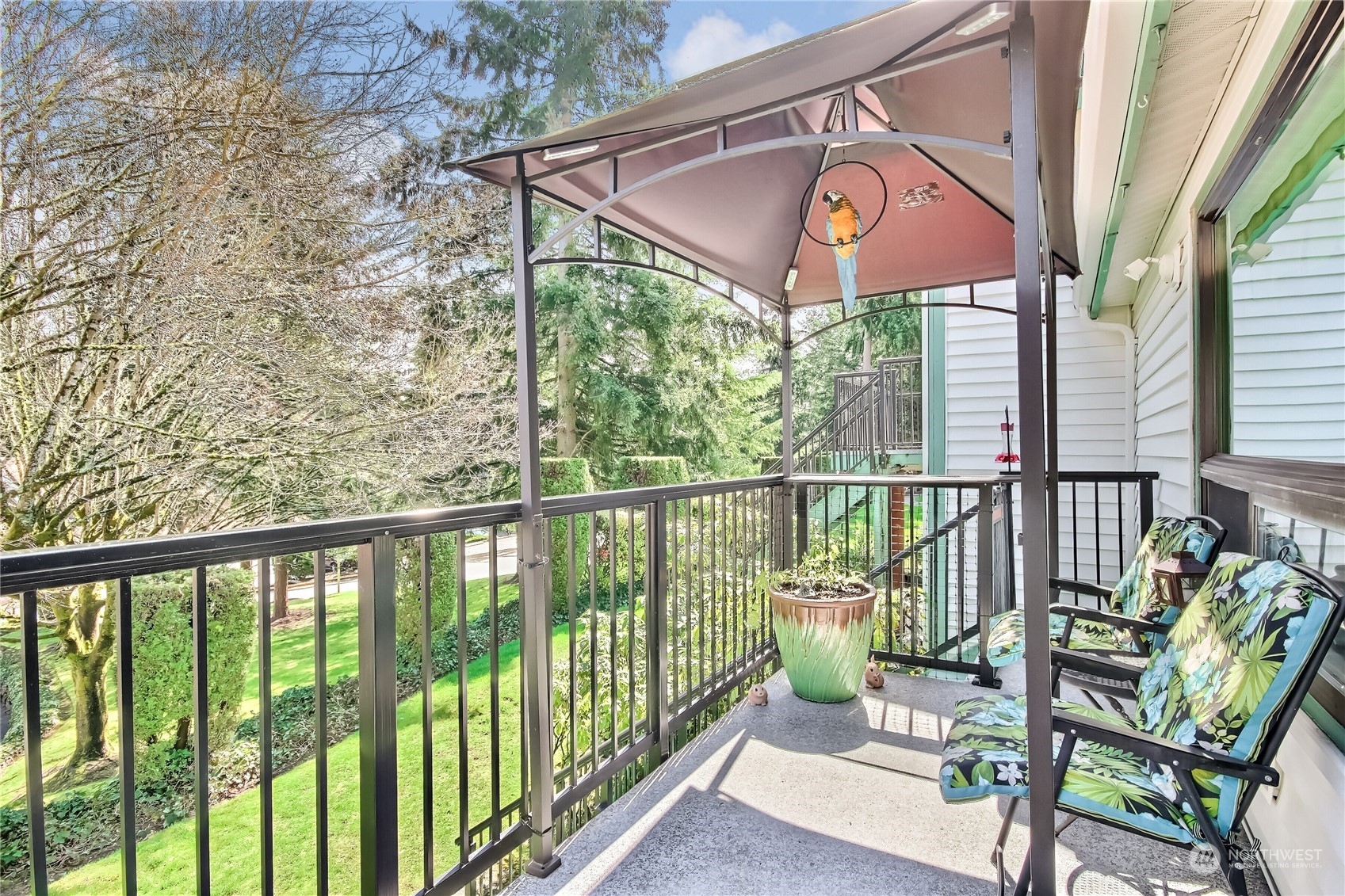 2003 Southwest 318th Place, Unit D8 Federal Way, WA 98023 - Photo 18 of 35 a view of a chairs and table in the balcony