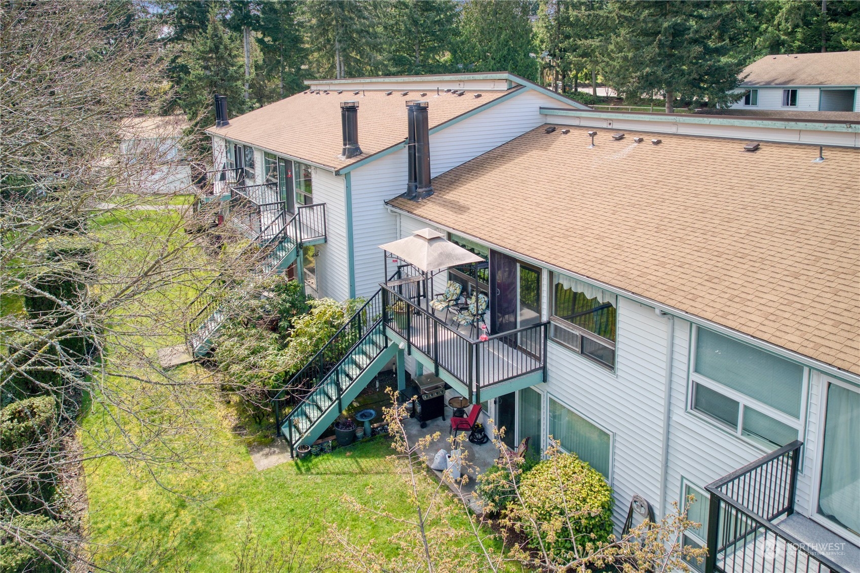 2003 Southwest 318th Place, Unit D8 Federal Way, WA 98023 - Photo 21 of 35 an aerial view of a house with a swimming pool