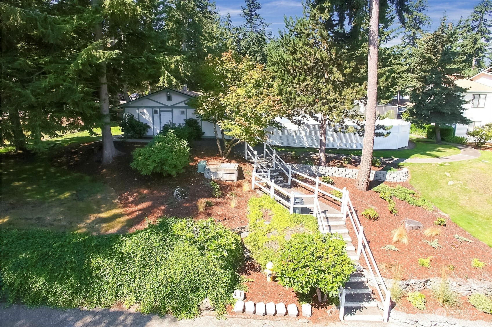 2003 Southwest 318th Place, Unit D8 Federal Way, WA 98023 - Photo 27 of 35 a view of a swimming pool with a yard