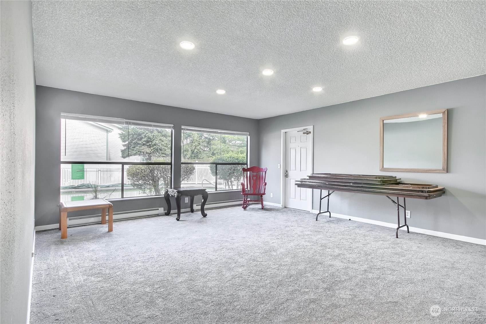 2003 Southwest 318th Place, Unit D8 Federal Way, WA 98023 - Photo 28 of 35 a living room with furniture and a window