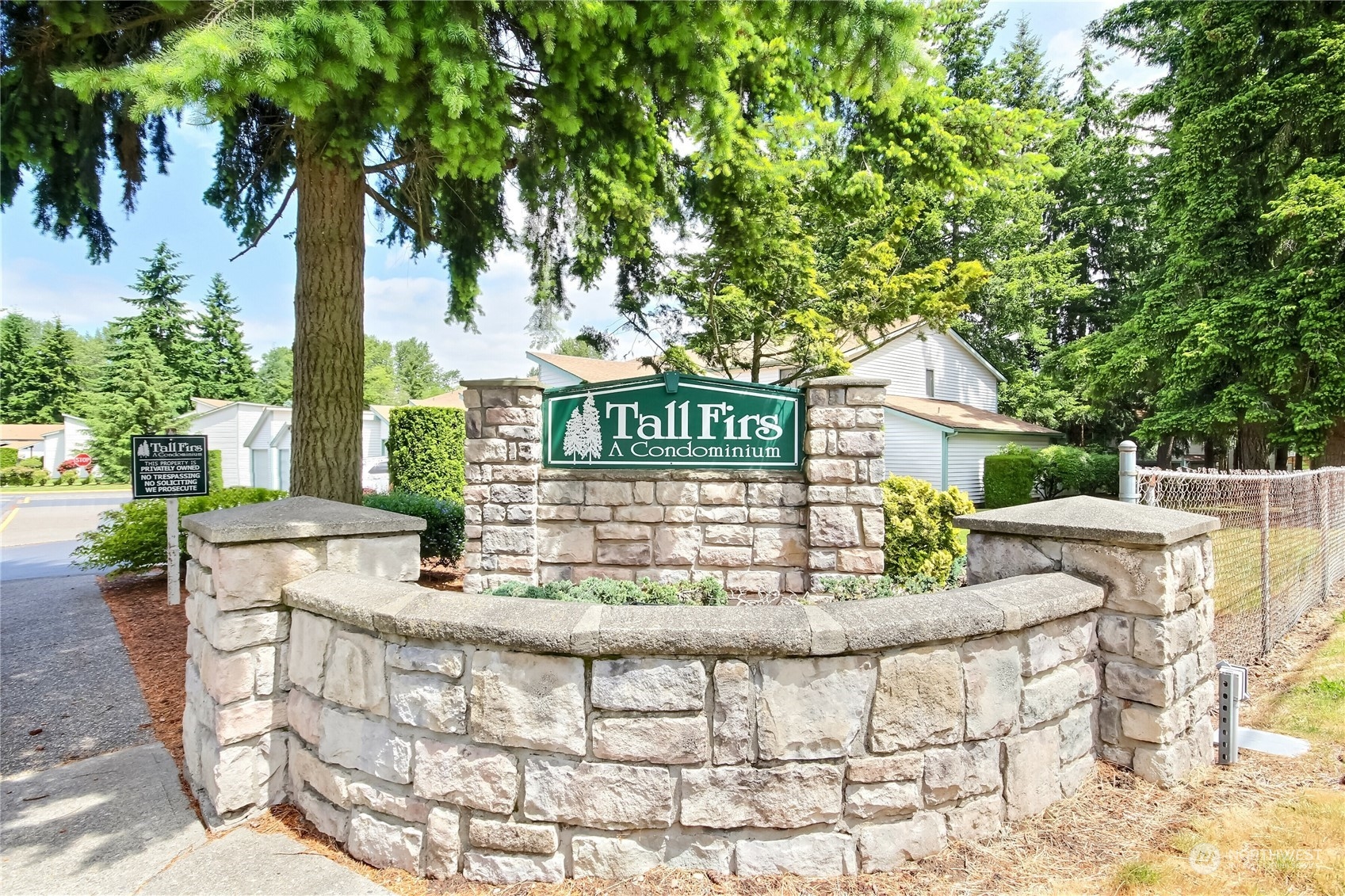 2003 Southwest 318th Place, Unit D8 Federal Way, WA 98023 - Photo 33 of 35 a view of house with a yard and sitting area