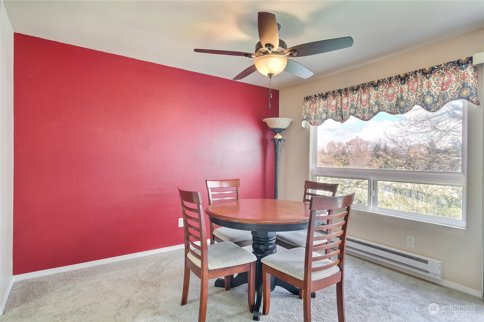 2003 Southwest 318th Place, Unit D8 Federal Way, WA 98023 - Photo 6 of 35 a view of a dining room with furniture and a window