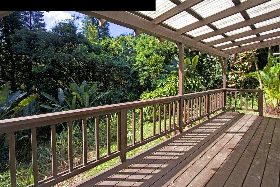 994 Kauhikoa Road Haiku, HI 96708 - Photo 3 of 13 a view of balcony with wooden floor