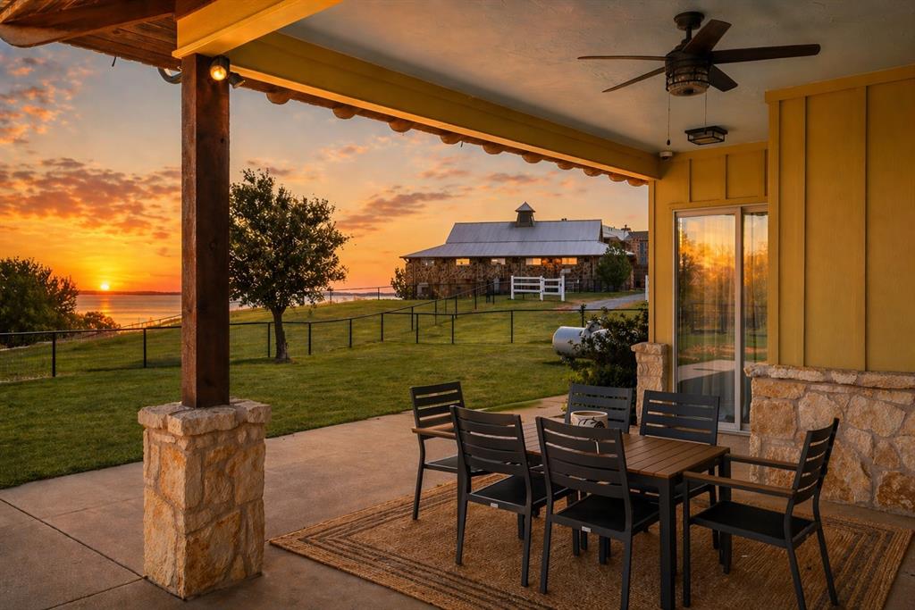 1180 McReynolds Road Sanger, TX 76266 - Photo 5 of 40 Covered patio with a stone base column and exposed wood beam