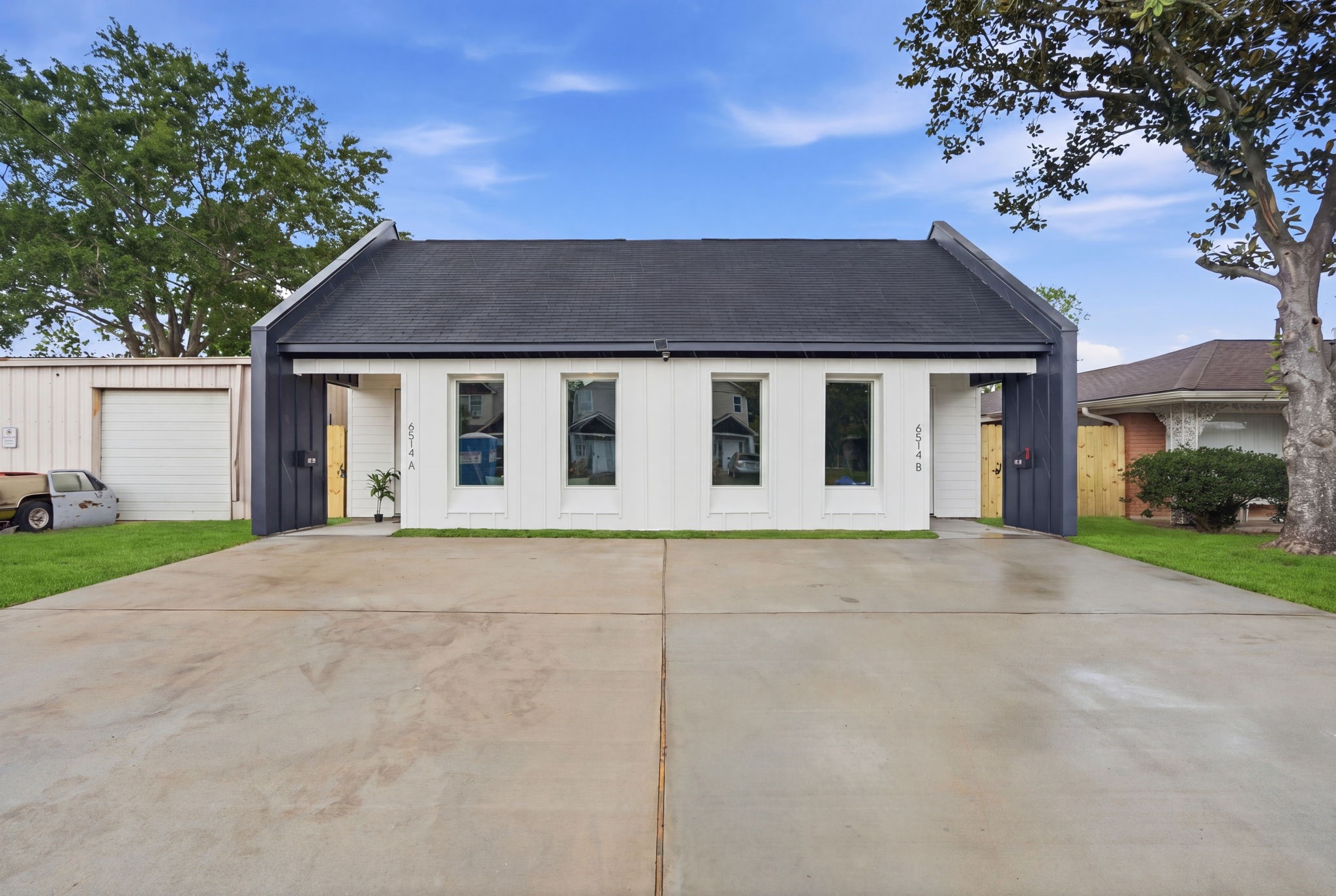 a house view with a garden space