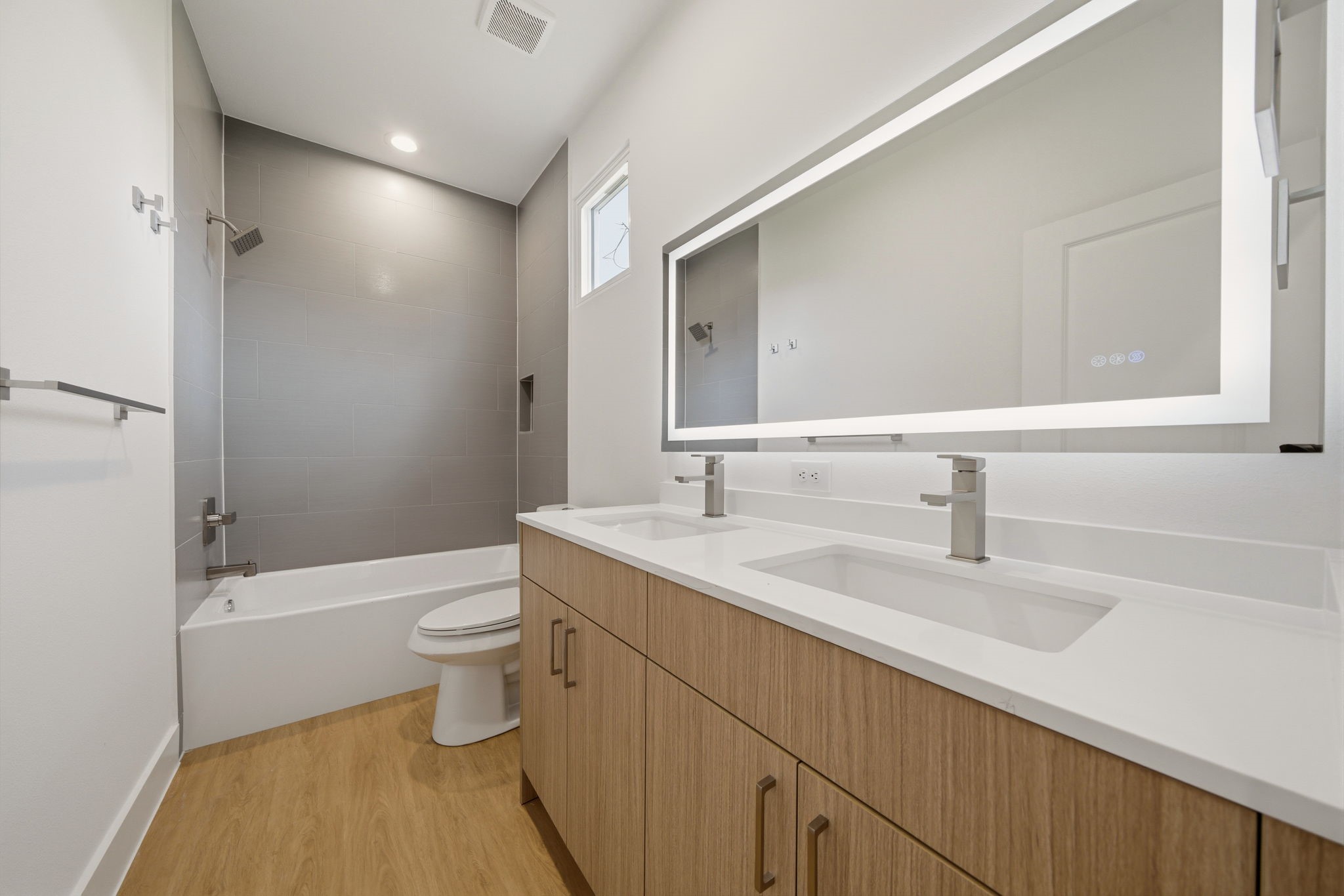 6514 Luce Street Houston, TX 77087 - Photo 31 of 34 a bathroom with a sink a toilet and shower