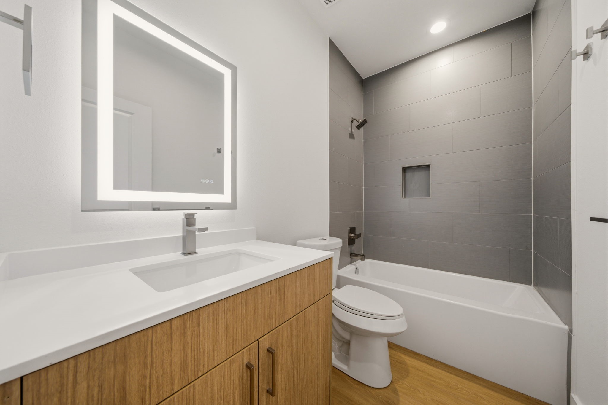 6514 Luce Street Houston, TX 77087 - Photo 32 of 34 a bathroom with a sink and a mirror