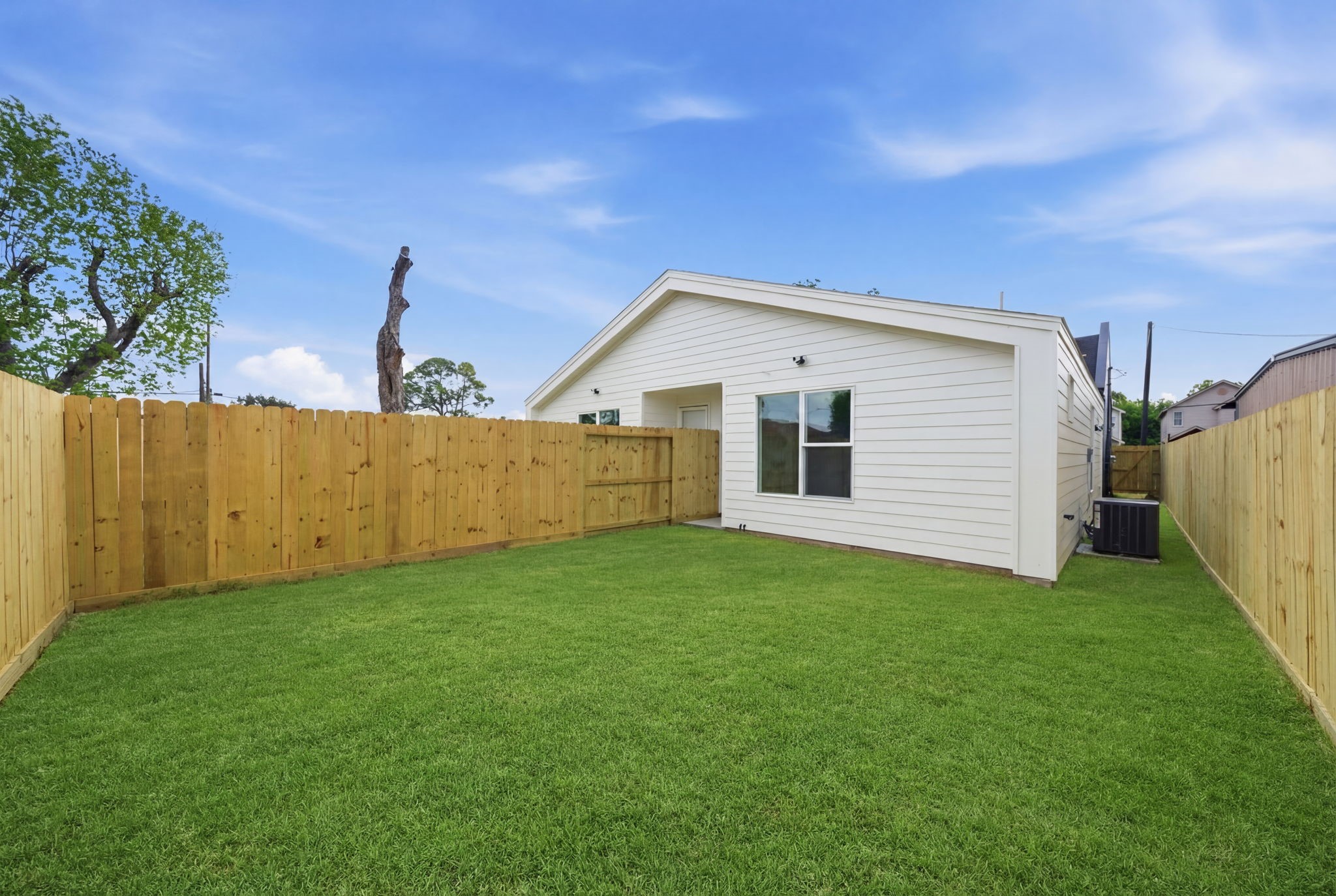 6514 Luce Street Houston, TX 77087 - Photo 33 of 34 a view of a backyard with potted plants