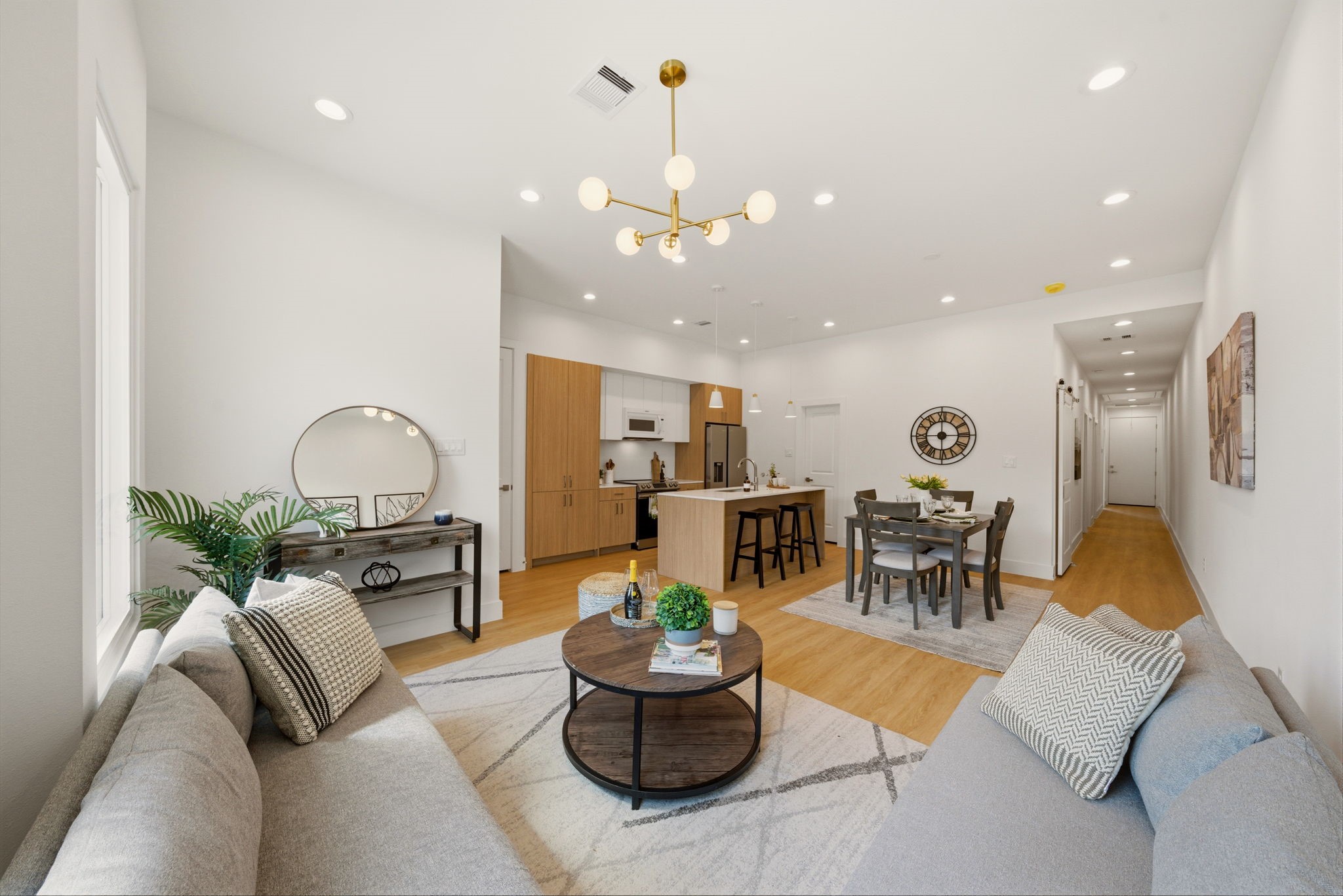 6514 Luce Street Houston, TX 77087 - Photo 4 of 34 a living room with furniture and kitchen view