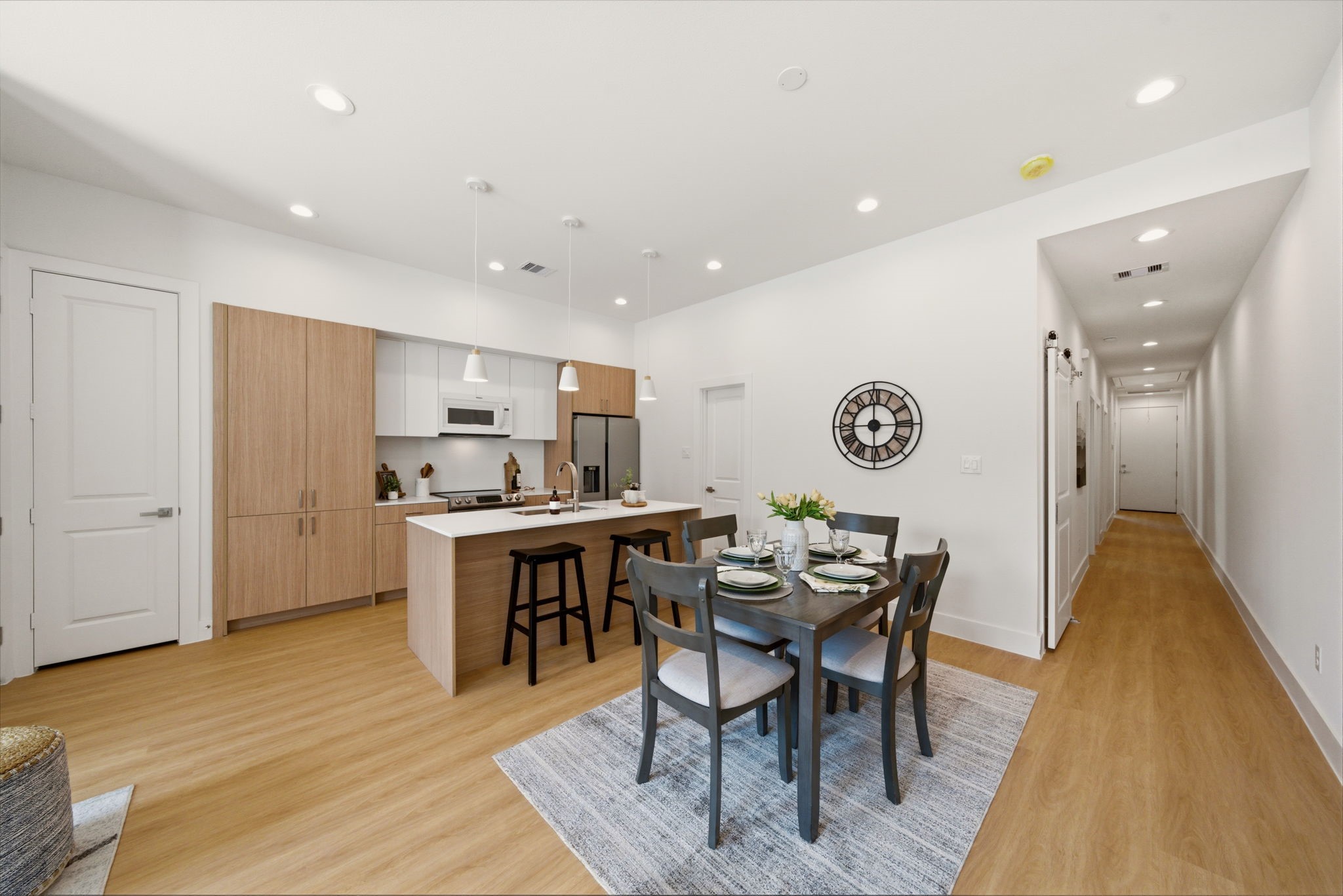 6514 Luce Street Houston, TX 77087 - Photo 7 of 34 a view of a dining room with furniture and wooden floor
