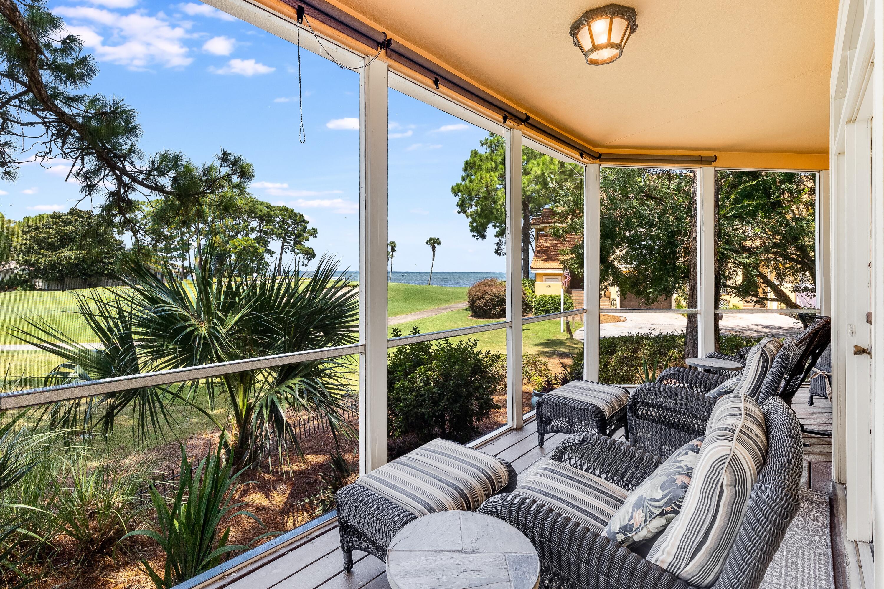 51 Vantage Point Miramar Beach, FL 32550 - Photo 18 of 64 a balcony with furniture and a potted plant