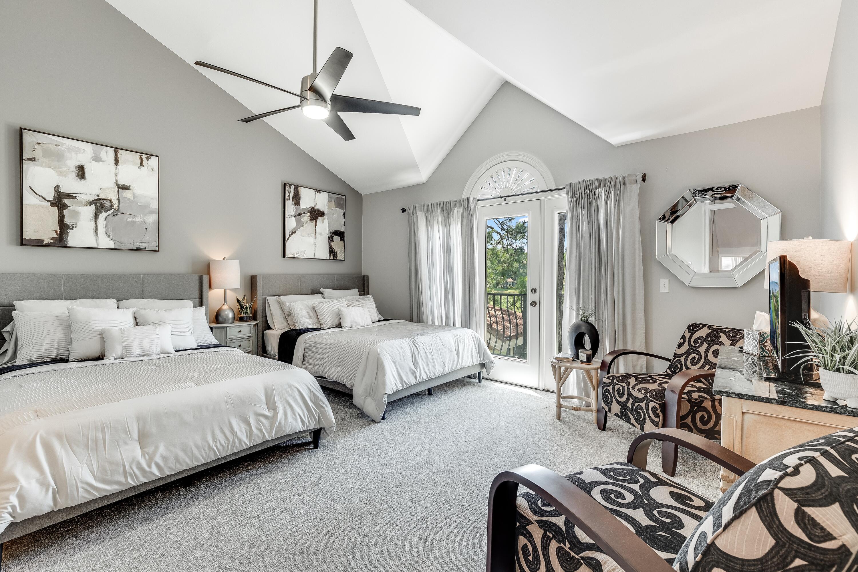 51 Vantage Point Miramar Beach, FL 32550 - Photo 38 of 64 a bedroom with bed a couch and a large mirror