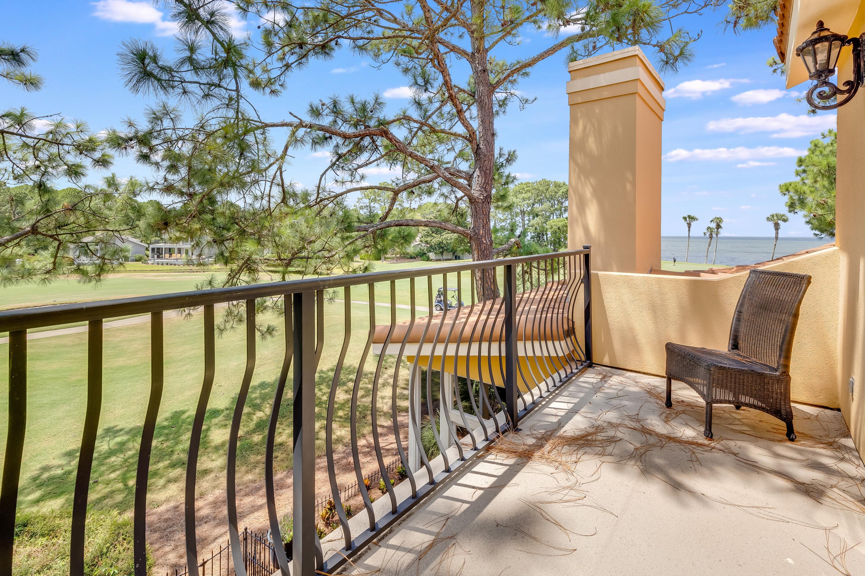 51 Vantage Point Miramar Beach, FL 32550 - Photo 44 of 64 a view of a chairs and table in the balcony