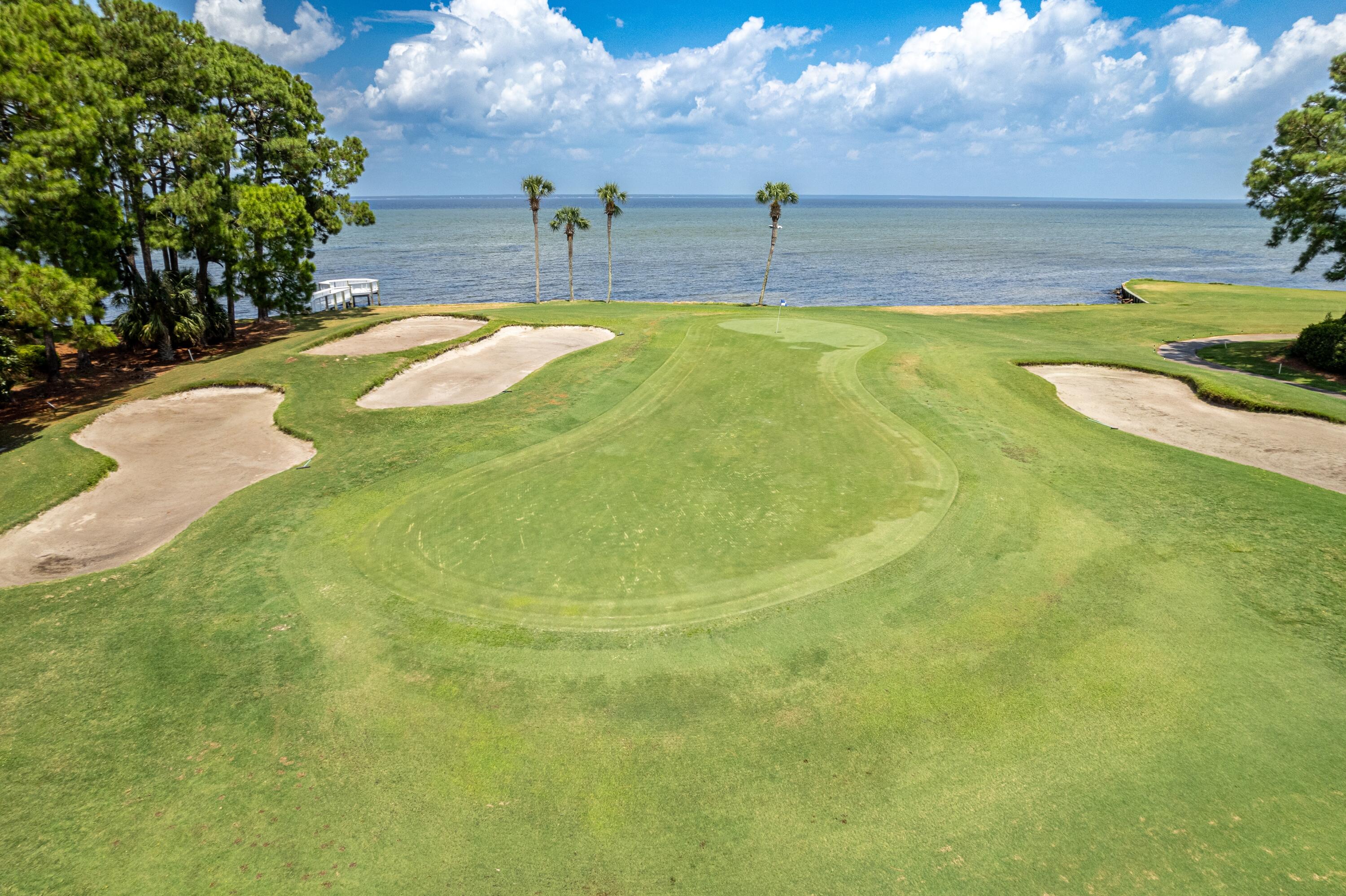51 Vantage Point Miramar Beach, FL 32550 - Photo 47 of 64 a view of a swimming pool with an outdoor space and seating area