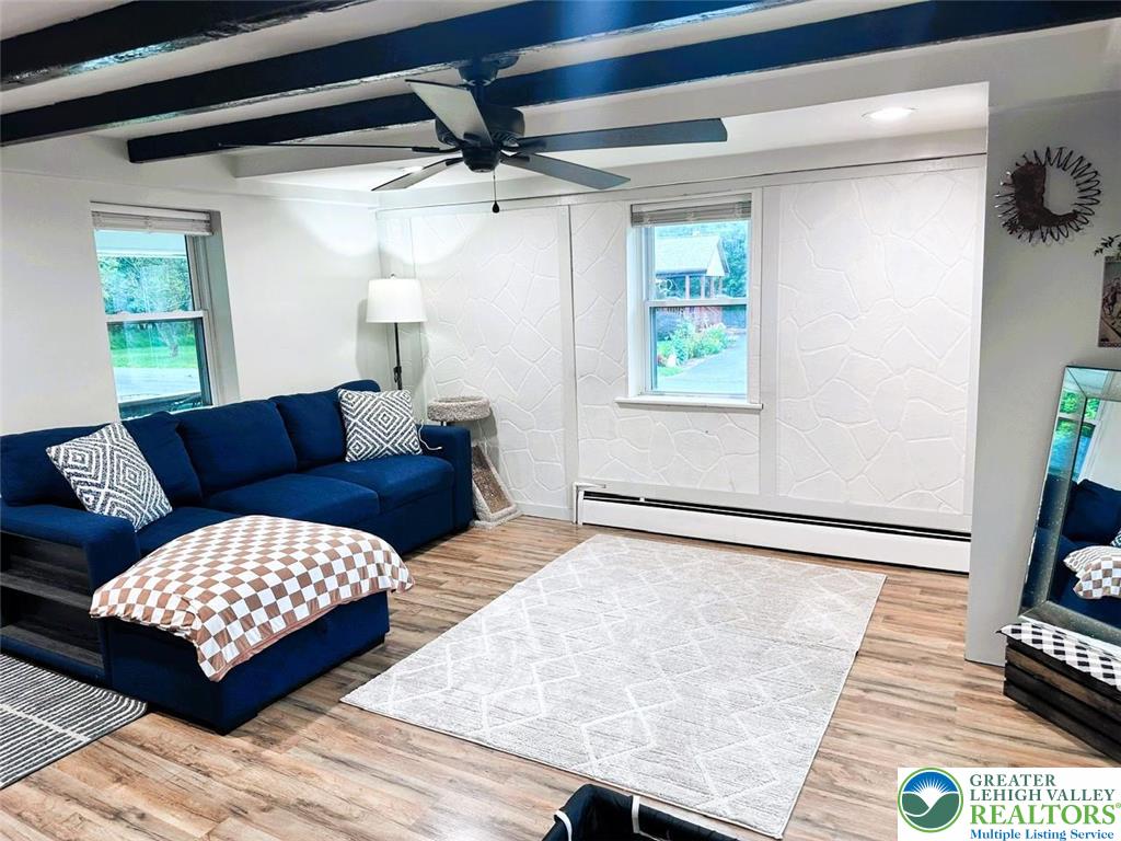 1250 Myrtle Road Walnutport, PA 18088 - Photo 12 of 30 a living room with furniture and a flat screen tv