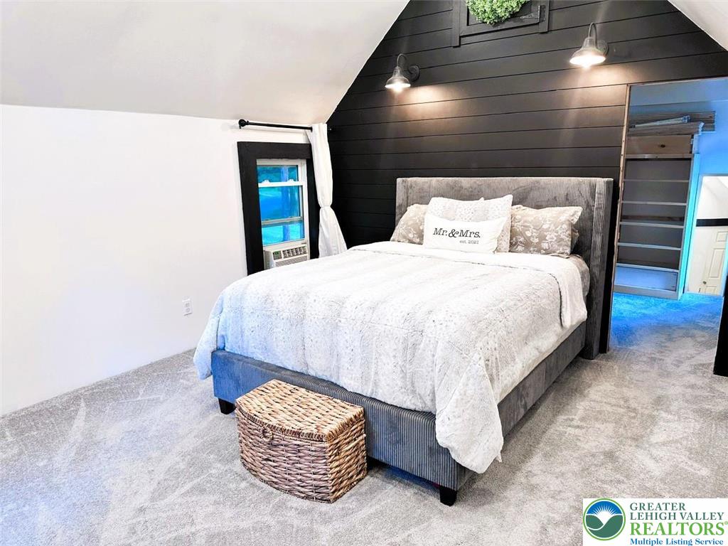 1250 Myrtle Road Walnutport, PA 18088 - Photo 13 of 30 a bed sitting in a bedroom next to a window