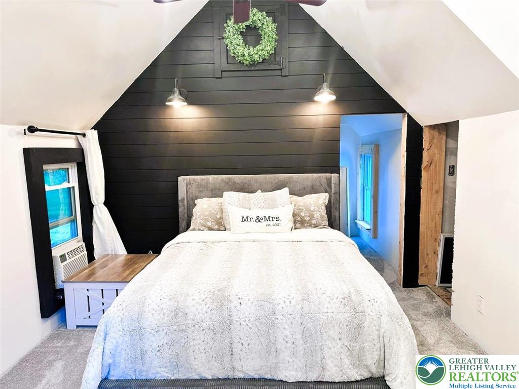 1250 Myrtle Road Walnutport, PA 18088 - Photo 14 of 30 a bed sitting in a bedroom next to a window