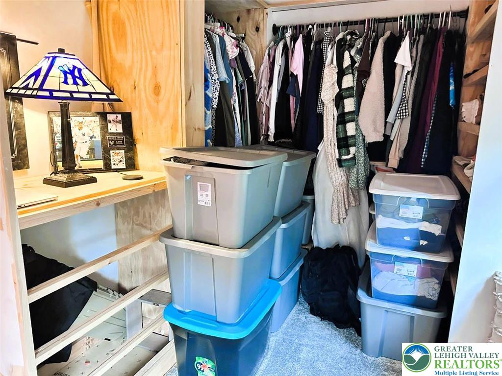 1250 Myrtle Road Walnutport, PA 18088 - Photo 16 of 30 a view of walk in closet with clothes and shoes