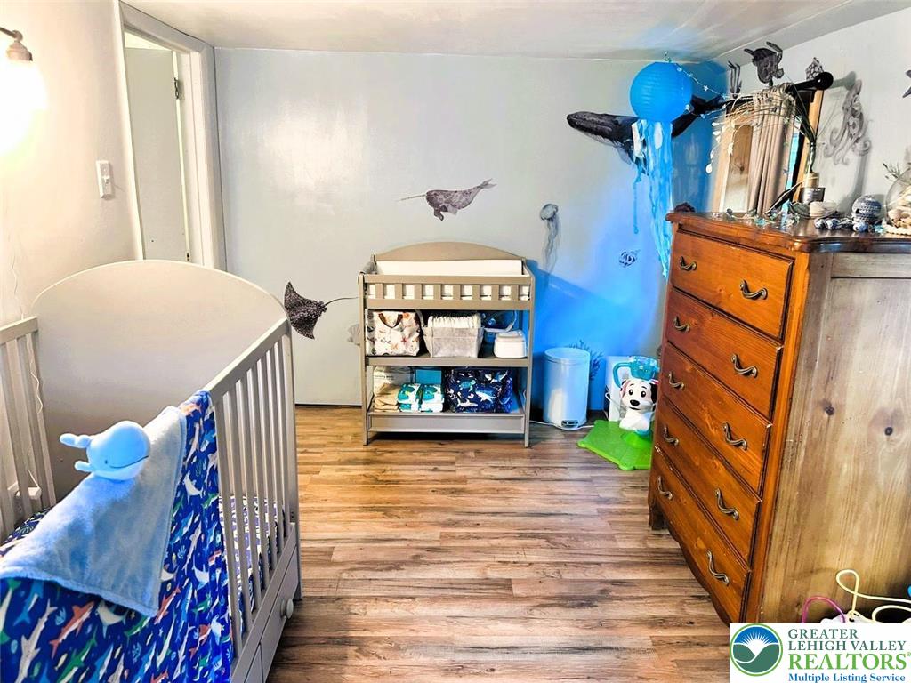 1250 Myrtle Road Walnutport, PA 18088 - Photo 19 of 30 a view of a hallway with wooden floor and staircase