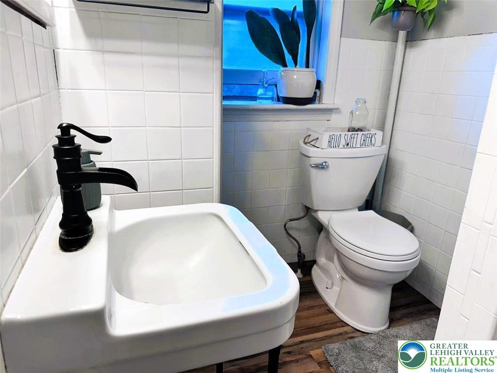 1250 Myrtle Road Walnutport, PA 18088 - Photo 20 of 30 a bathroom with a toilet and a sink