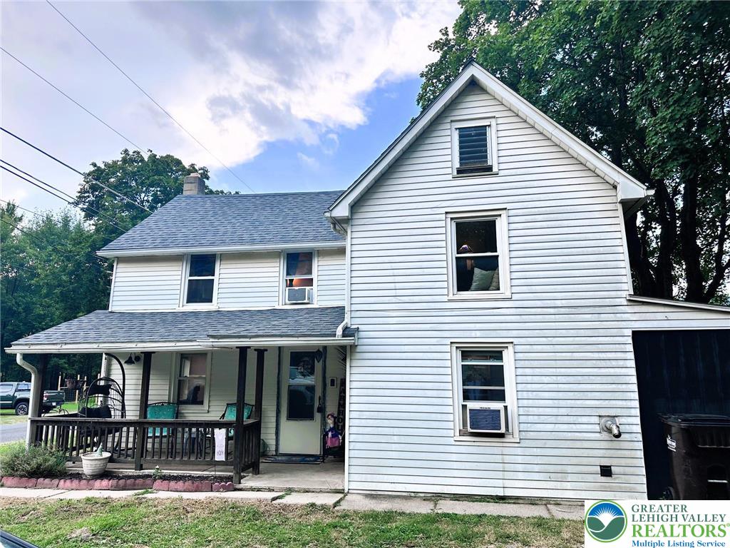1250 Myrtle Road Walnutport, PA 18088 - Photo 2 of 30 a view of a white house next to a yard