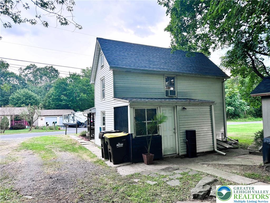 1250 Myrtle Road Walnutport, PA 18088 - Photo 30 of 30 a view of a house with a yard and furniture