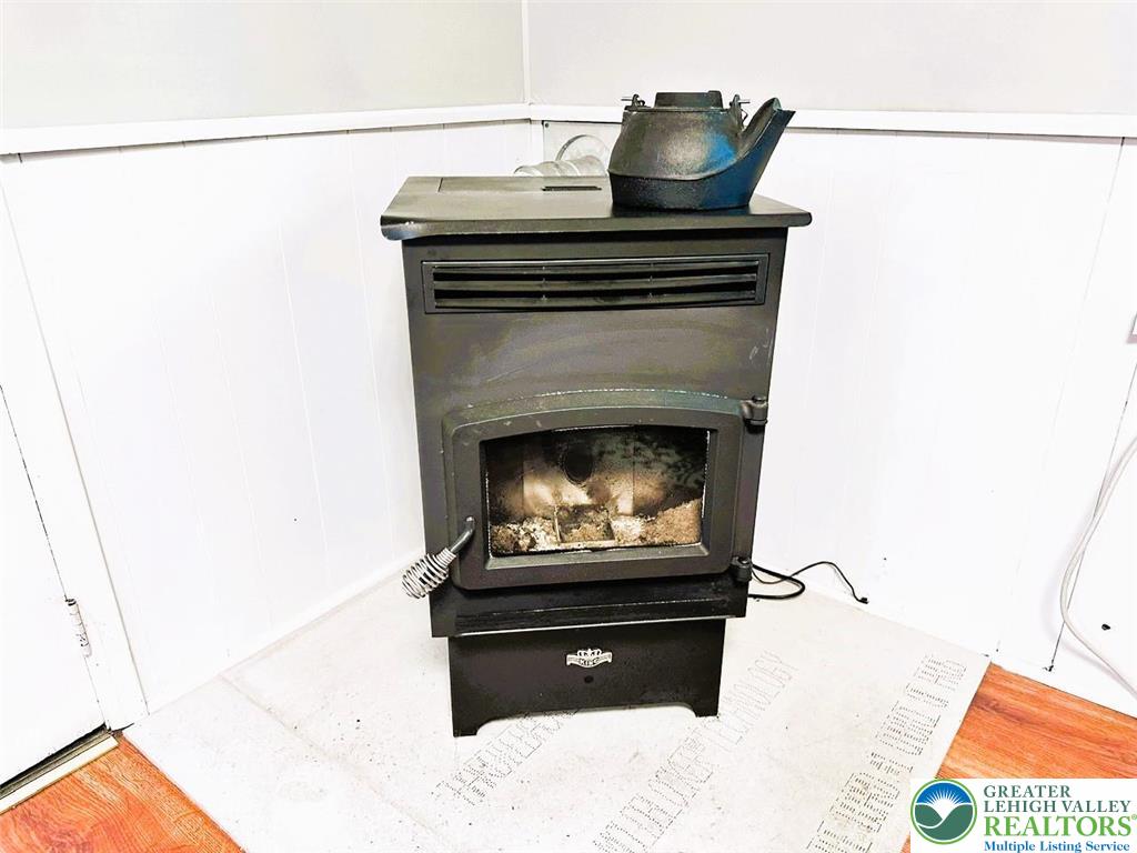 1250 Myrtle Road Walnutport, PA 18088 - Photo 8 of 30 a living room with furniture and a fireplace