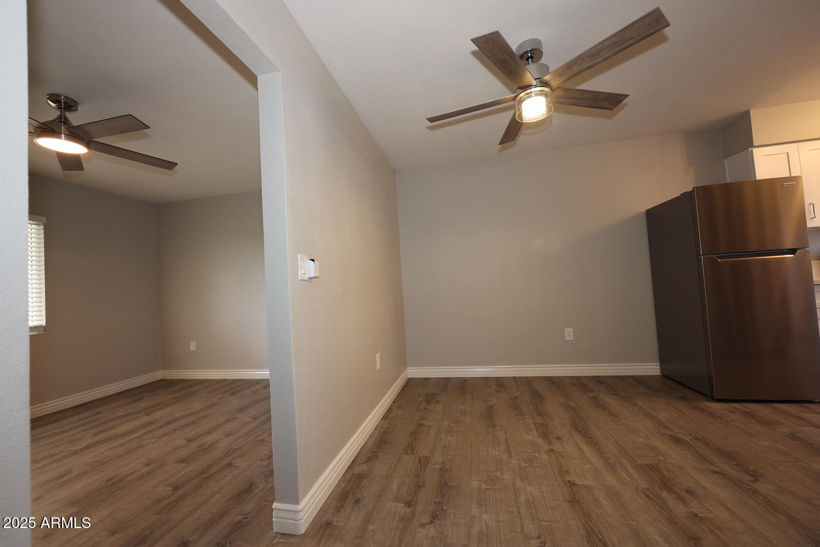 127 South Outpost Road, Unit 2 Apache Junction, AZ 85119 - Photo 14 of 14 wooden floor in an empty room with a window