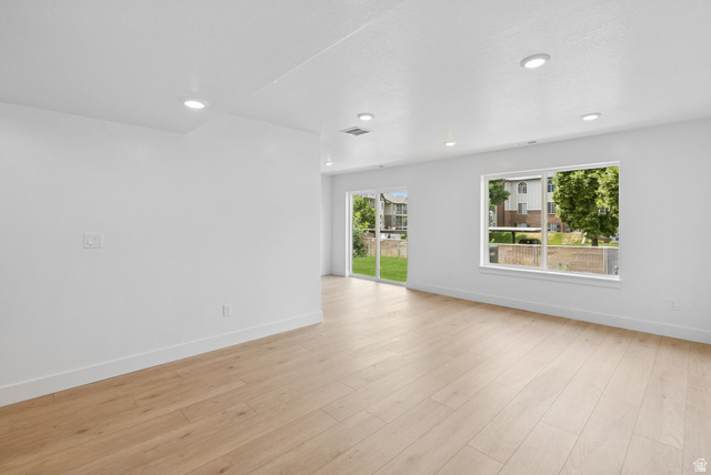 1617 North Angel Street Layton, UT 84041 - Photo 15 of 43 Unfurnished room with light wood finished floors and recessed lighting