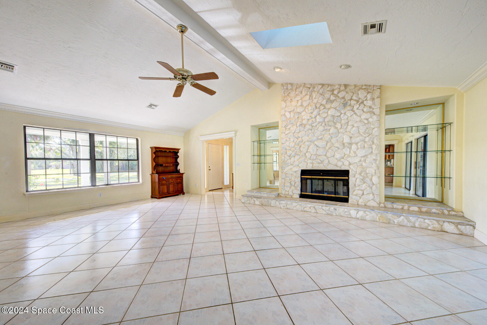 4050 Quail Path Road Cocoa, FL 32926 - Photo 11 of 60 living room with fireplace