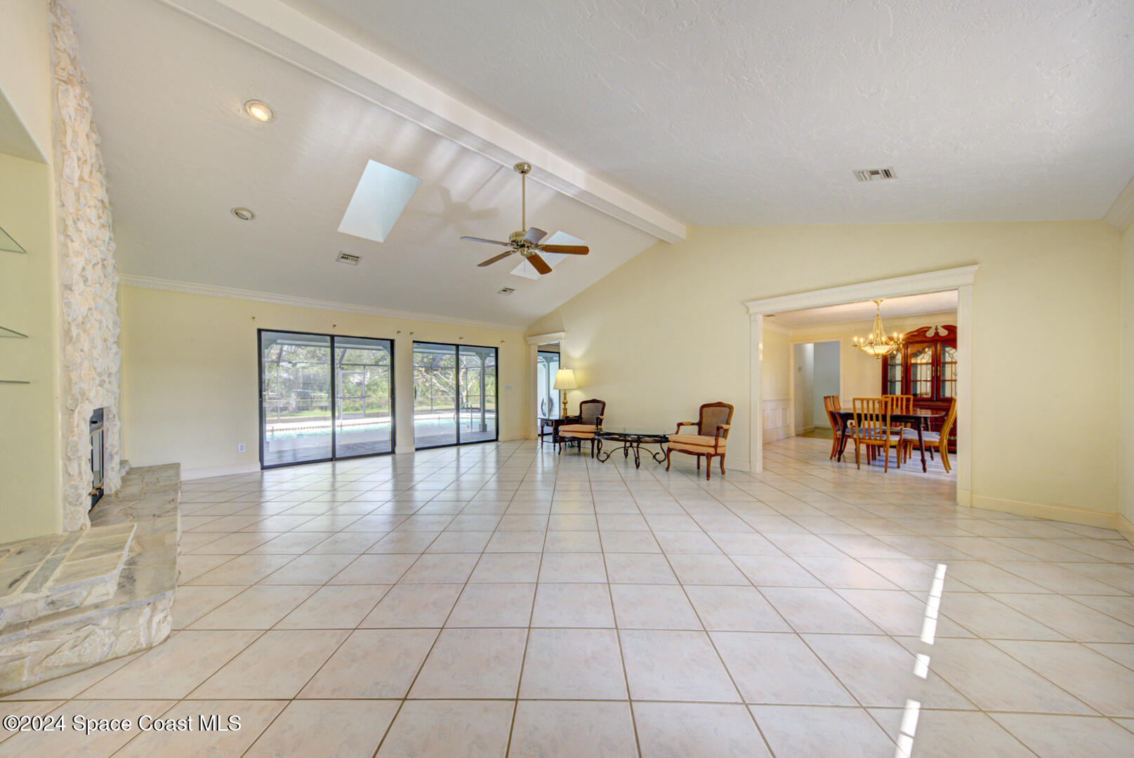 4050 Quail Path Road Cocoa, FL 32926 - Photo 13 of 60 living room with vaulted ceiling