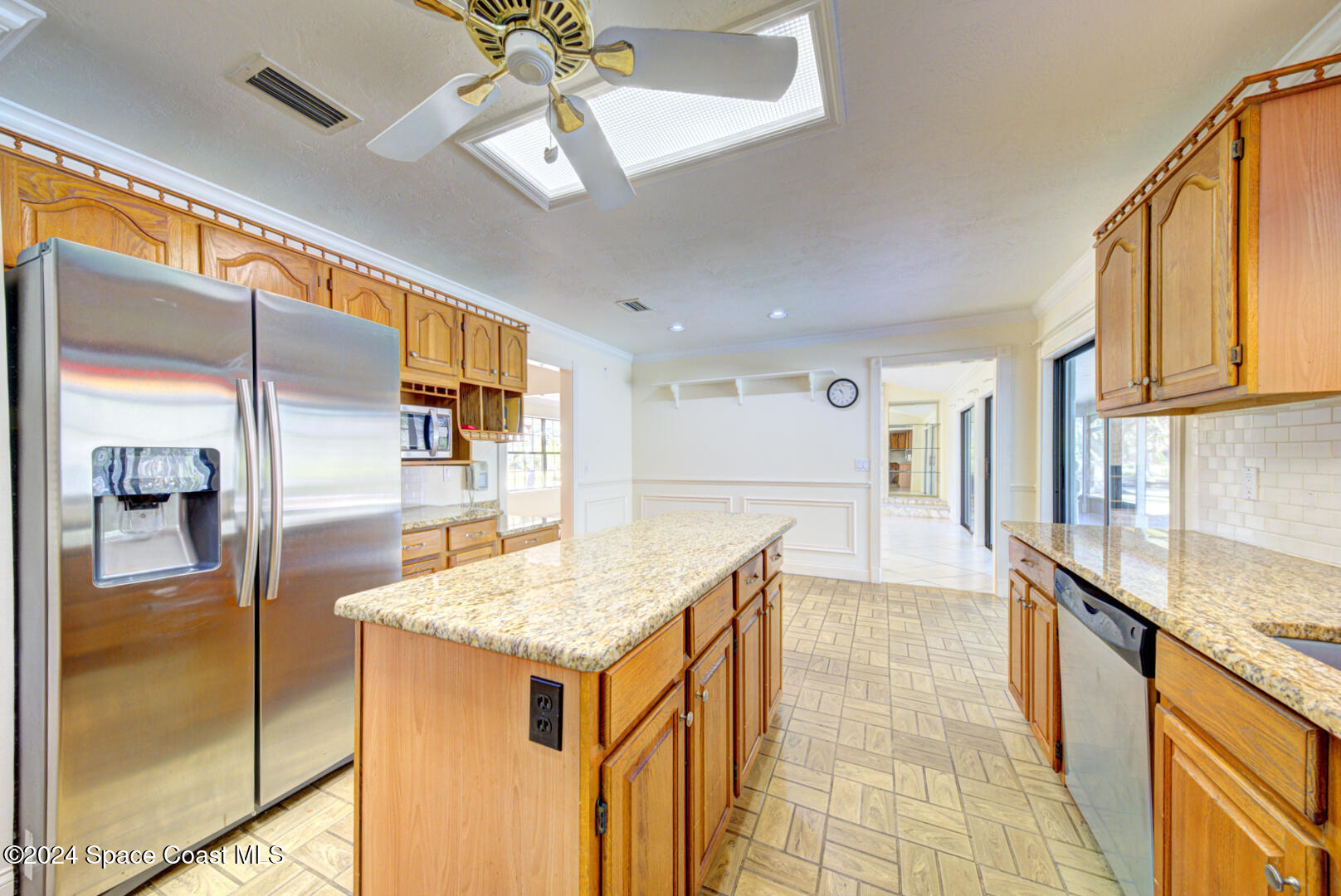 4050 Quail Path Road Cocoa, FL 32926 - Photo 21 of 60 kitchen with fan