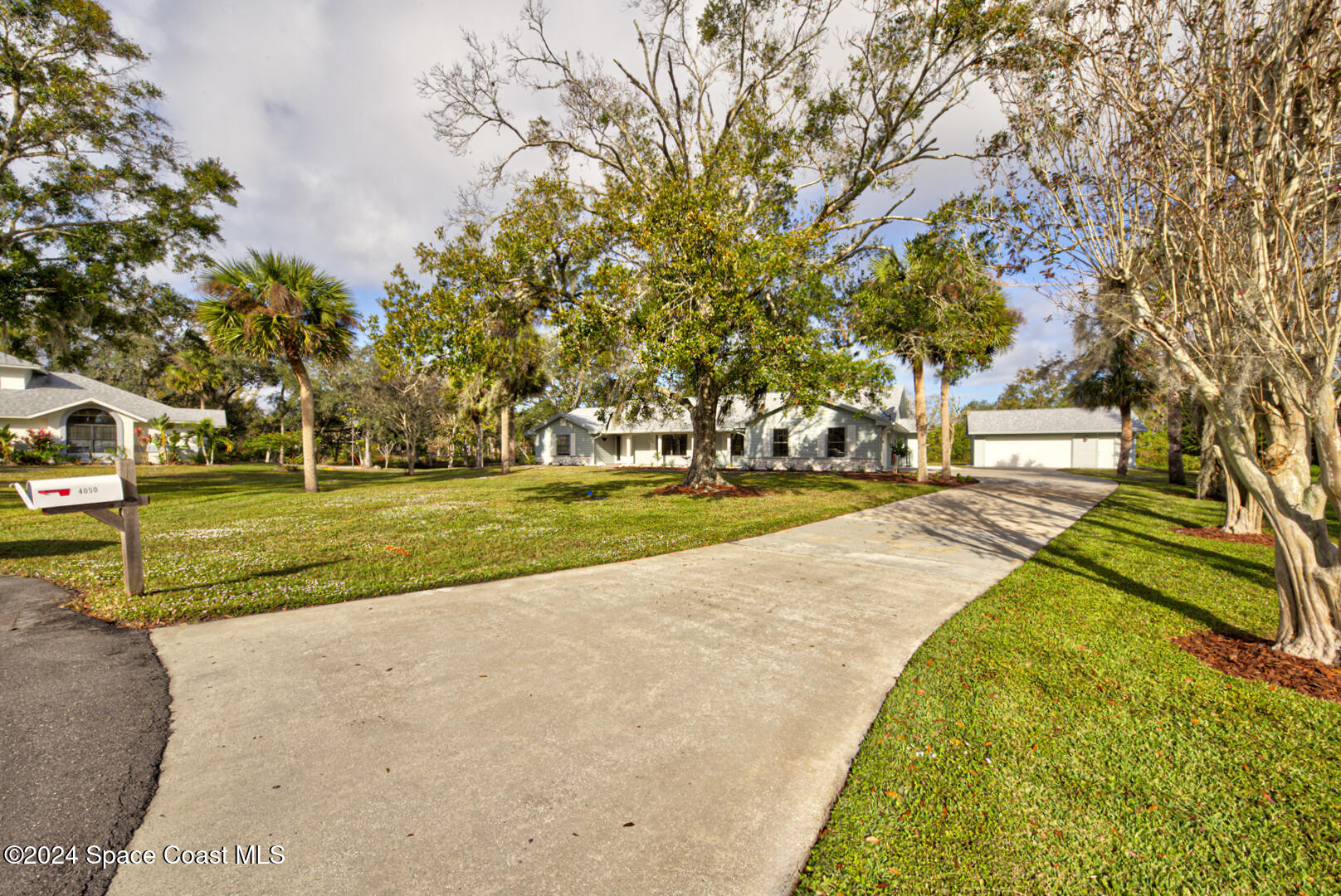 4050 Quail Path Road Cocoa, FL 32926 - Photo 3 of 60 front yard right