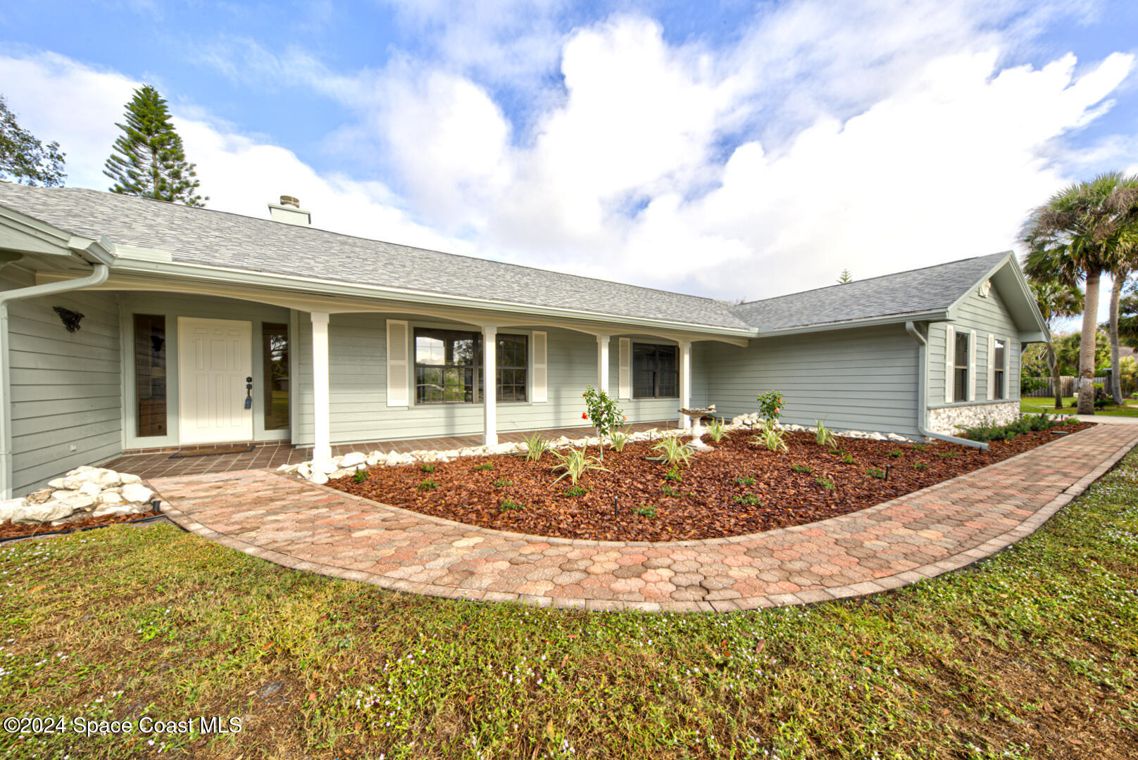 4050 Quail Path Road Cocoa, FL 32926 - Photo 5 of 60 walkway to front porch