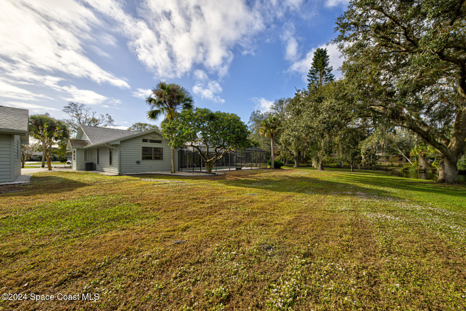 4050 Quail Path Road Cocoa, FL 32926 - Photo 55 of 60 back of house left