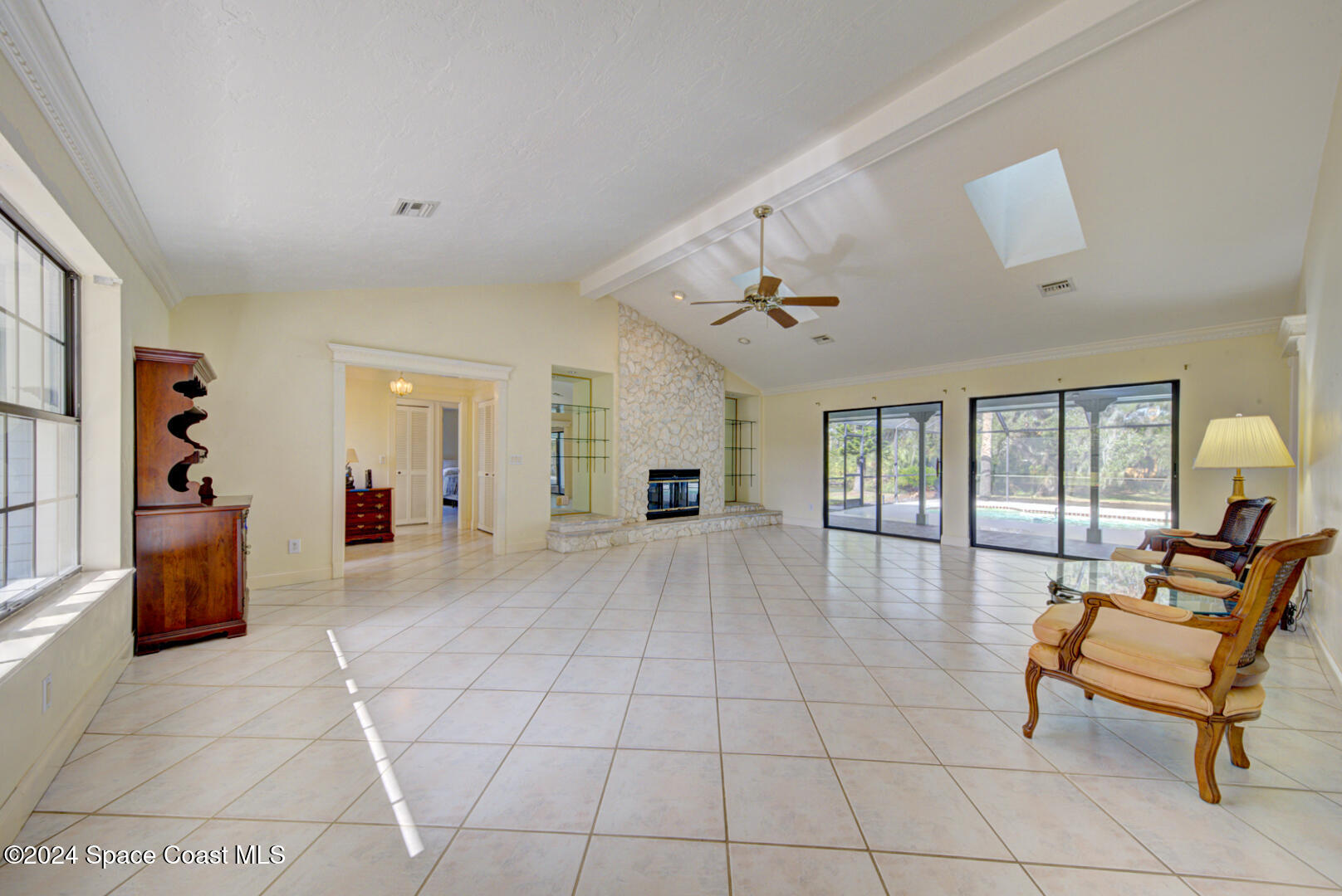 4050 Quail Path Road Cocoa, FL 32926 - Photo 10 of 60 living room with pool view