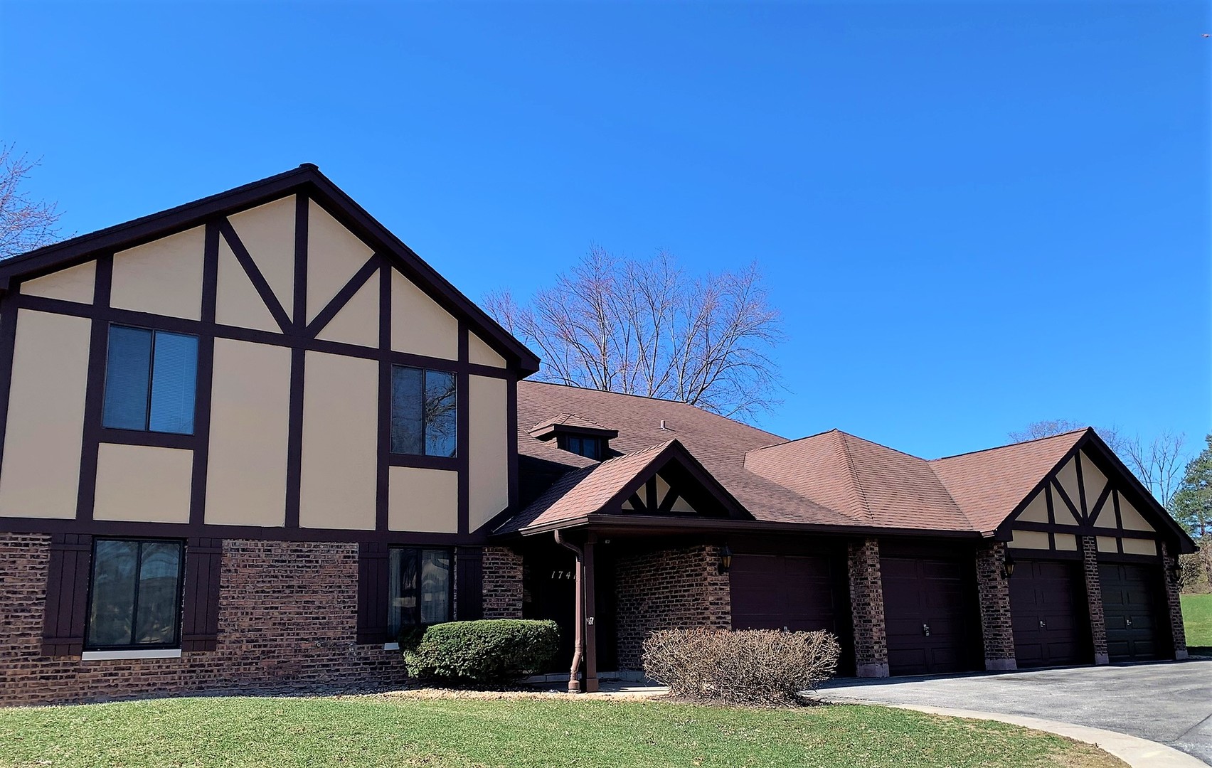 a front view of a house with yard