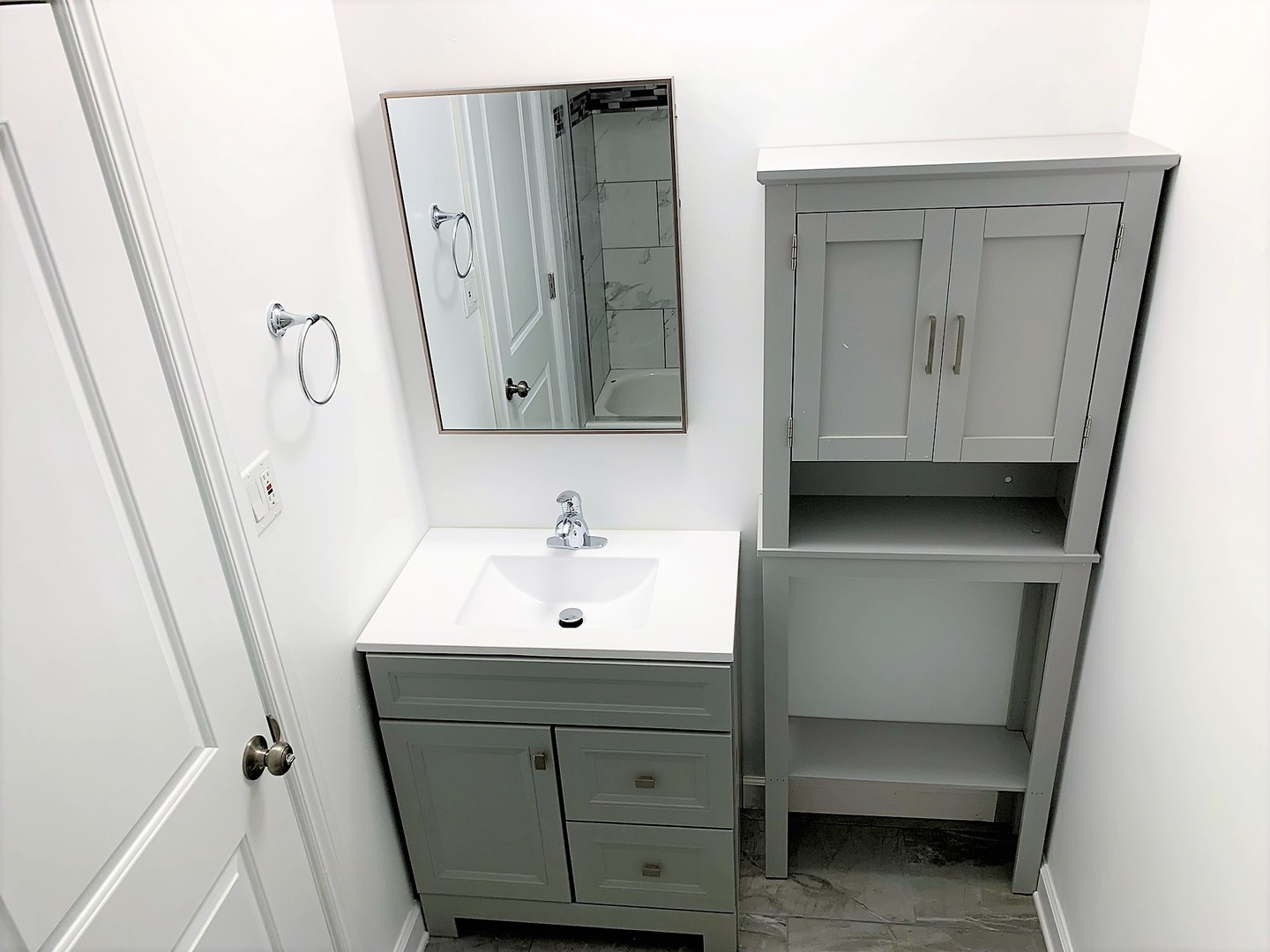 1741 Harrow Court, Unit B Wheaton, IL 60189 - Photo 17 of 24 a bathroom with a sink a toilet and a mirror