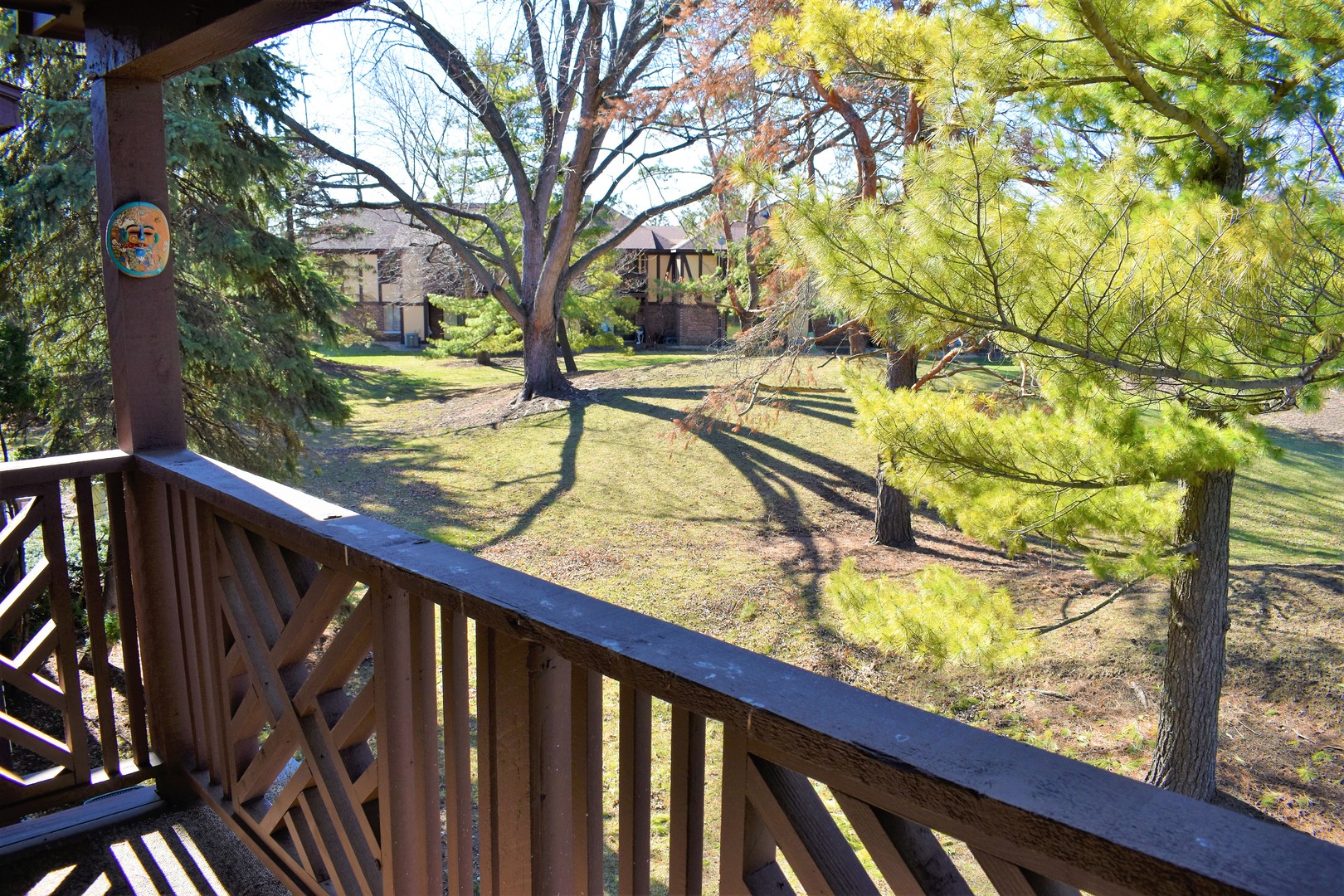 1741 Harrow Court, Unit B Wheaton, IL 60189 - Photo 23 of 24 a view of a balcony with trees