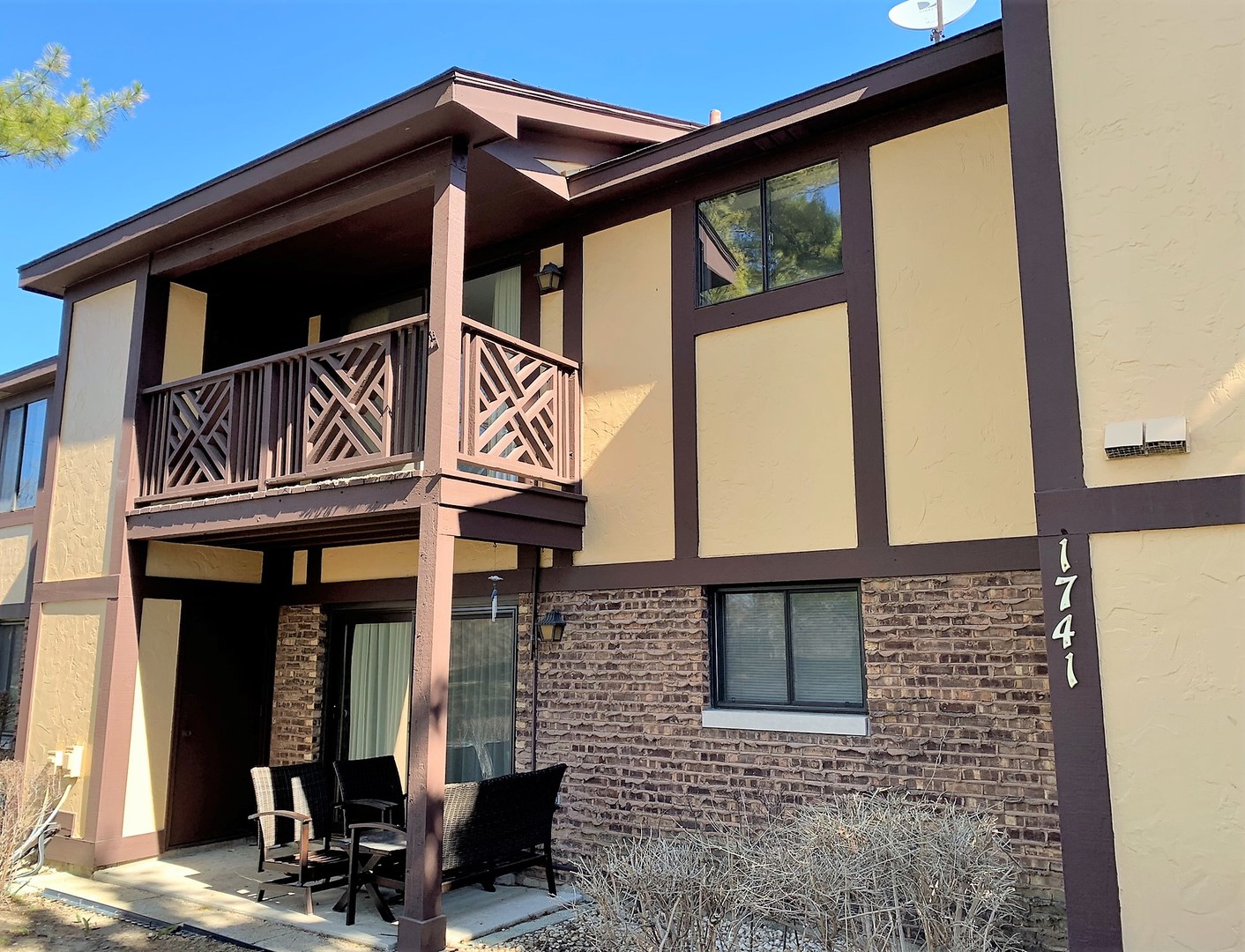 1741 Harrow Court, Unit B Wheaton, IL 60189 - Photo 24 of 24 a front view of a building with glass windows