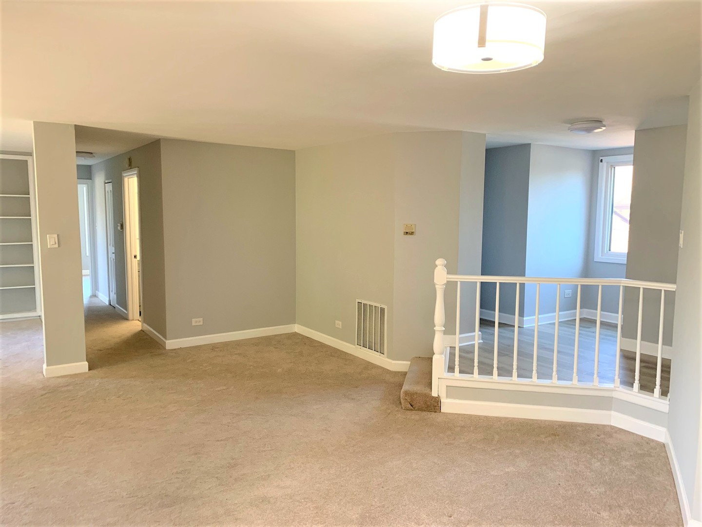 1741 Harrow Court, Unit B Wheaton, IL 60189 - Photo 6 of 24 a view of an empty room with a window