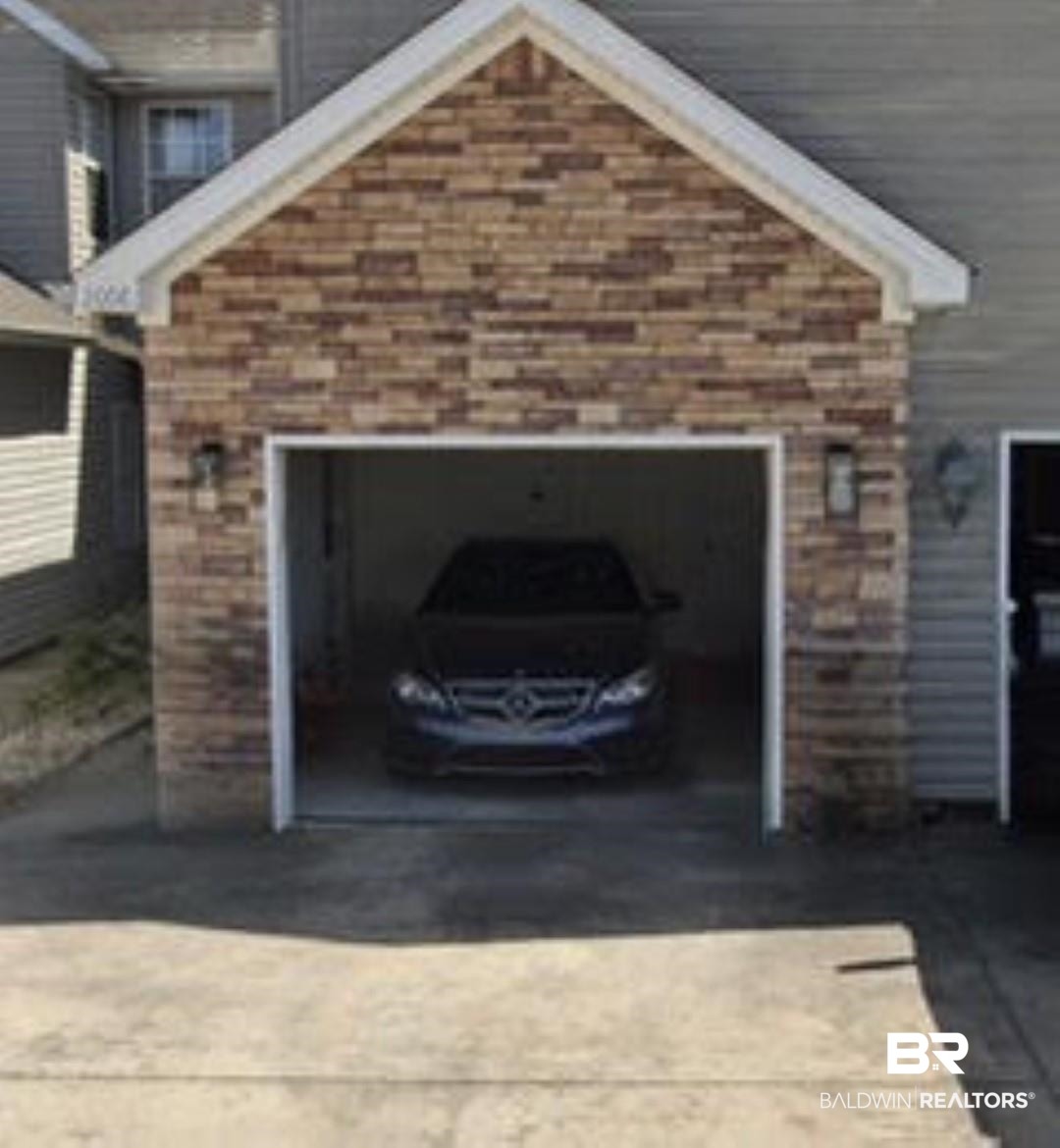 2006 Shelene Way, Unit 2006 Foley, AL 36535 - Photo 22 of 29 Garage featuring concrete driveway