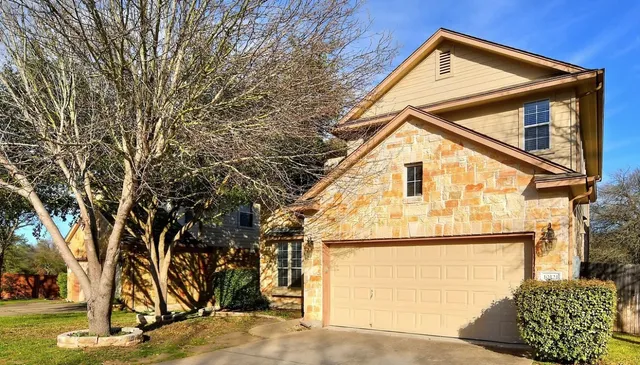 a view of a house with a snow