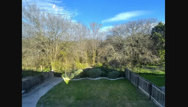 a view of outdoor space and yard