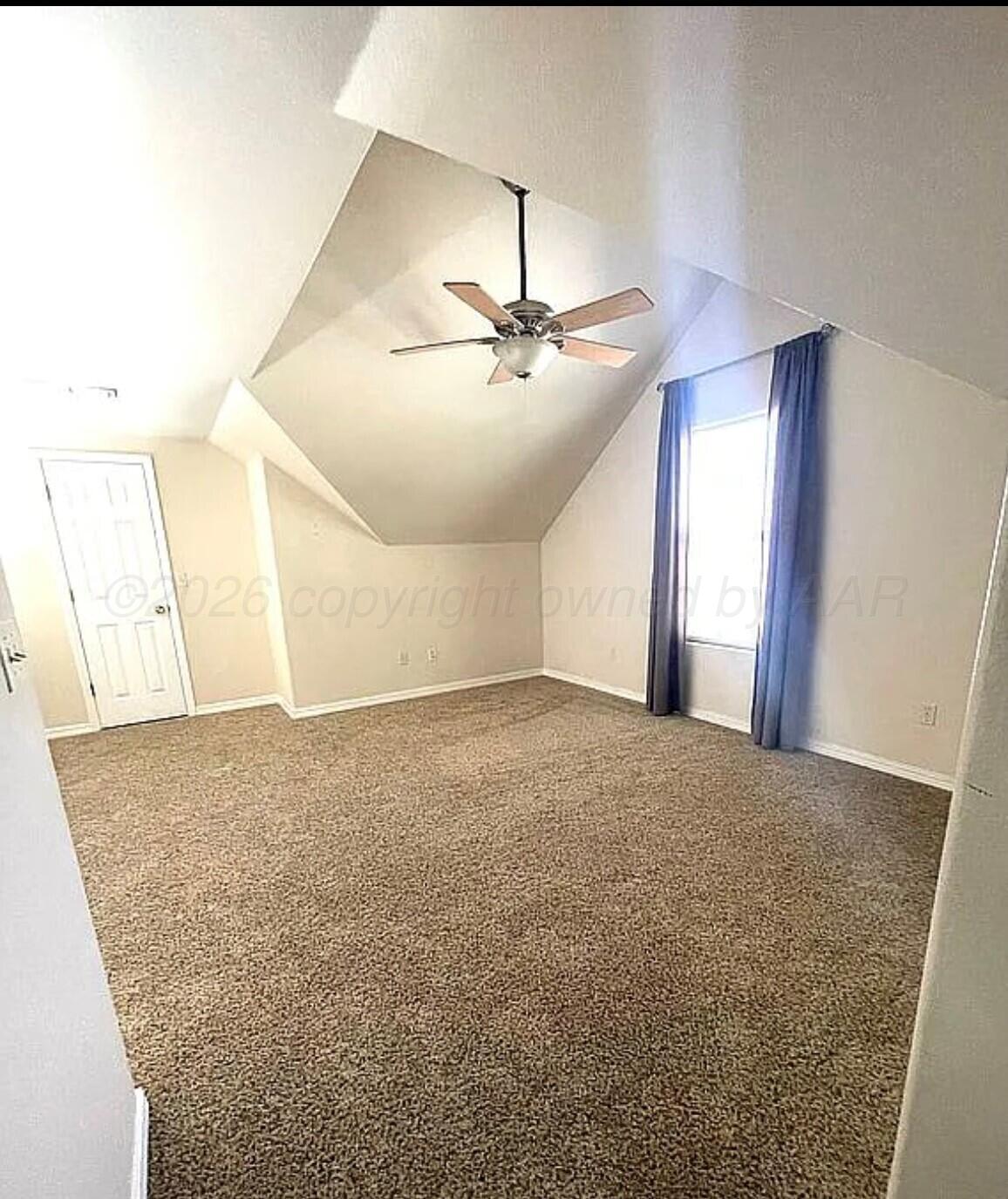 6001 Estacado Lane Amarillo, TX 79109 - Photo 13 of 21 a view of a big room with carpet