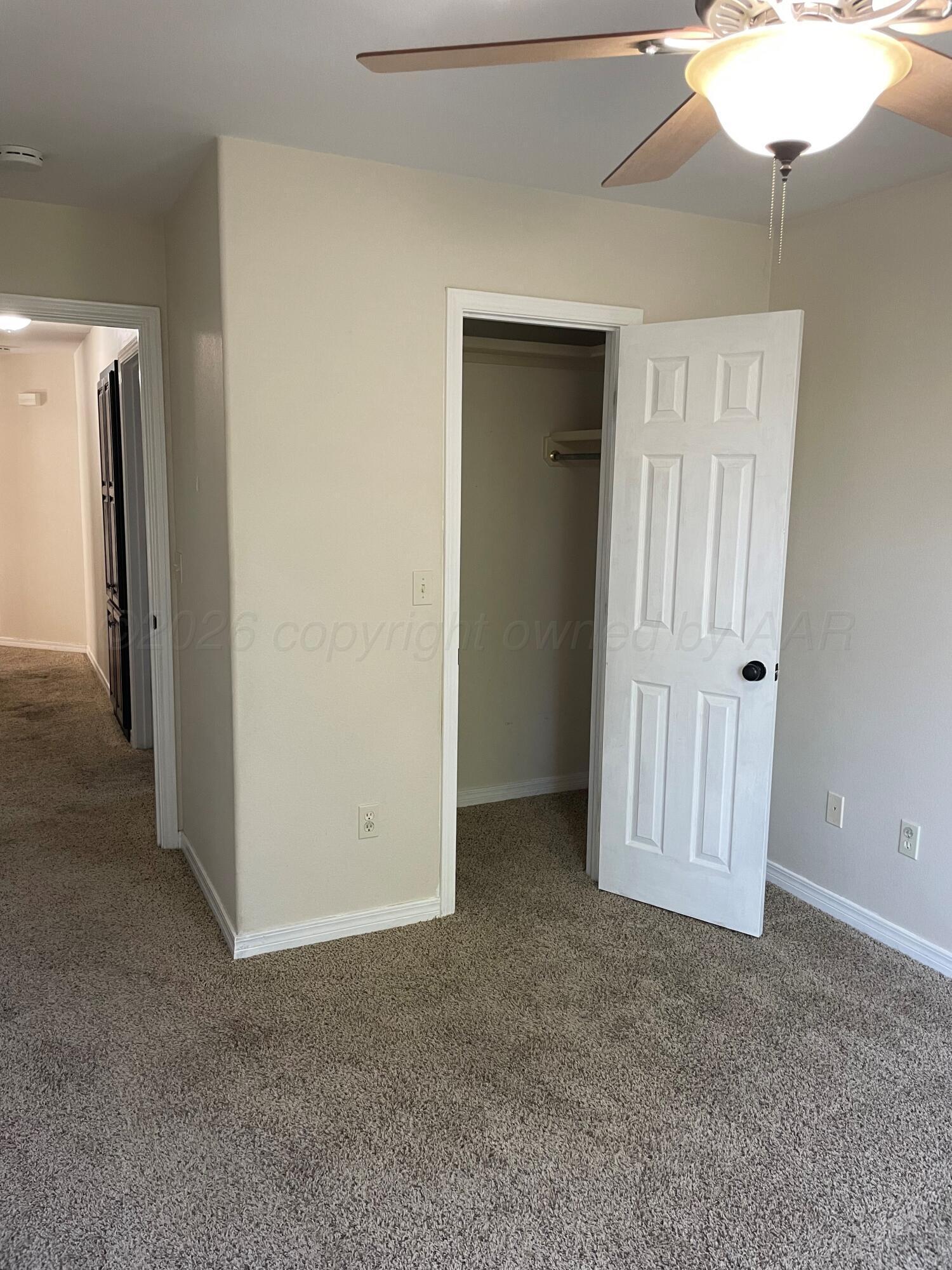 6001 Estacado Lane Amarillo, TX 79109 - Photo 14 of 21 a view of an empty room with a bathroom