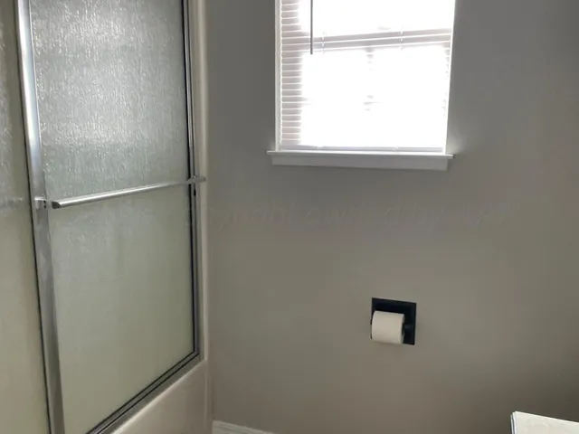a view of a window in an empty room