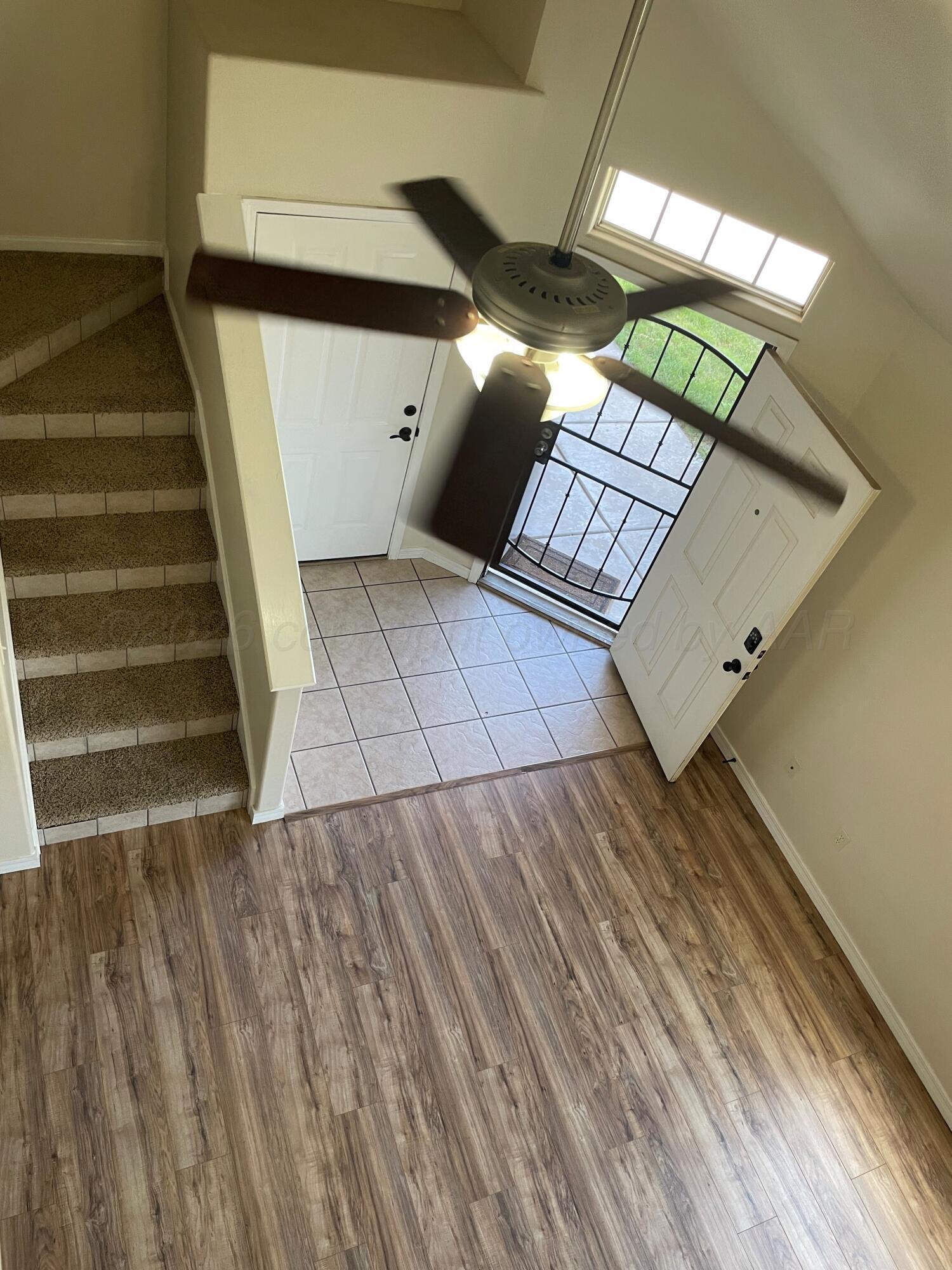 6001 Estacado Lane Amarillo, TX 79109 - Photo 19 of 21 a view of an entryway with wooden floor
