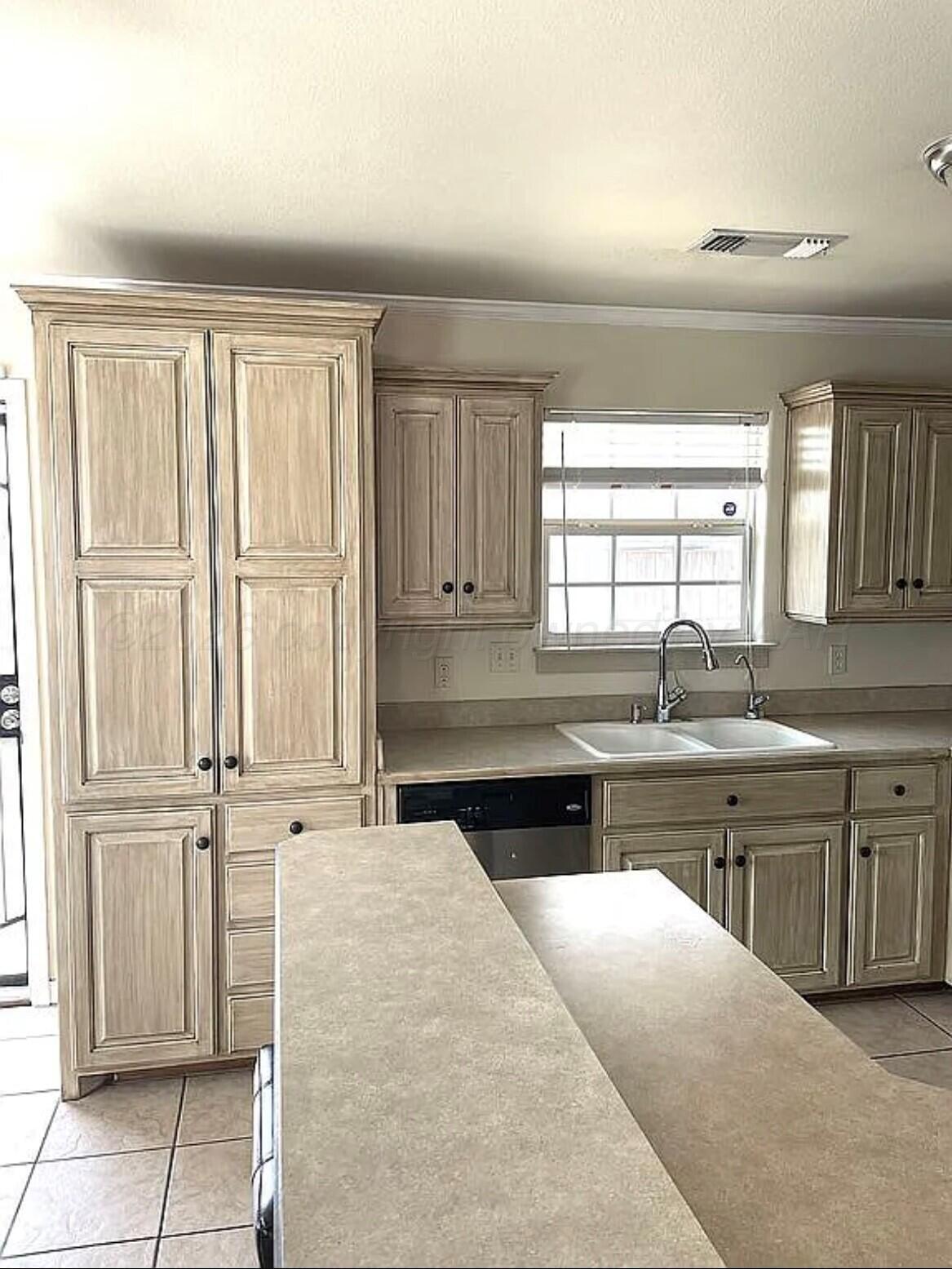 6001 Estacado Lane Amarillo, TX 79109 - Photo 6 of 21 a large kitchen with a large window